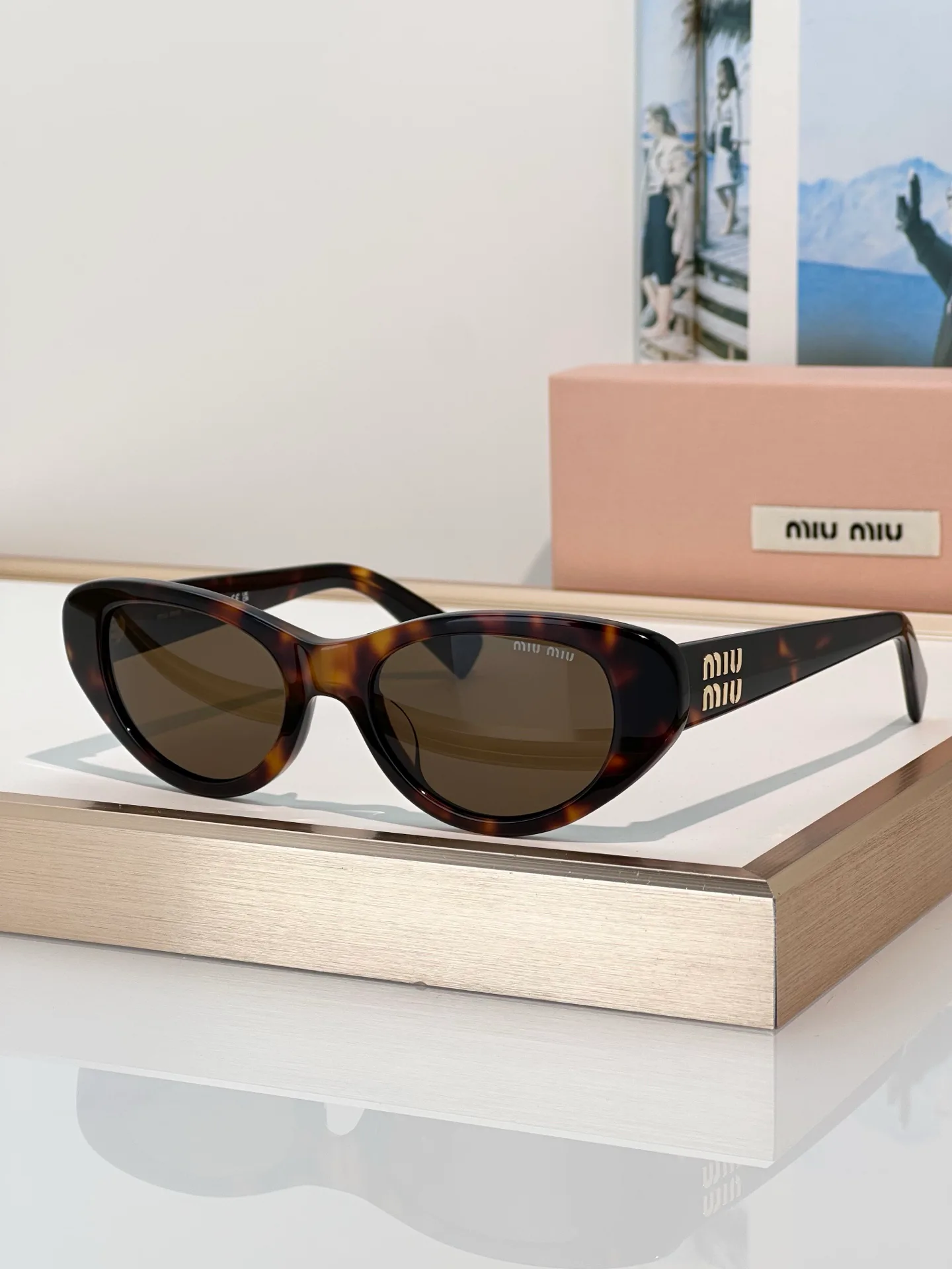Glasses MIU MIU 17565428
