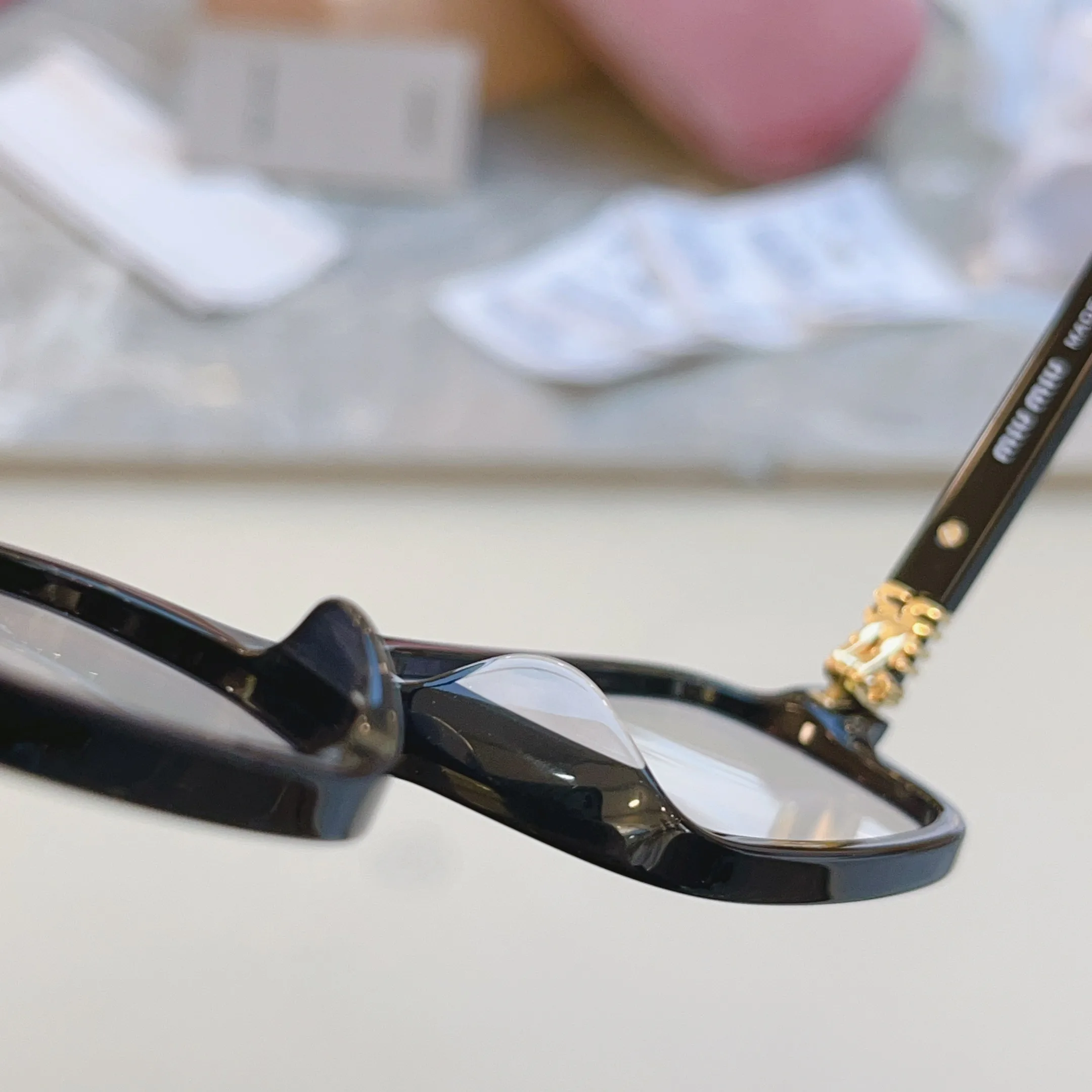 Glasses MIU MIU 17529370