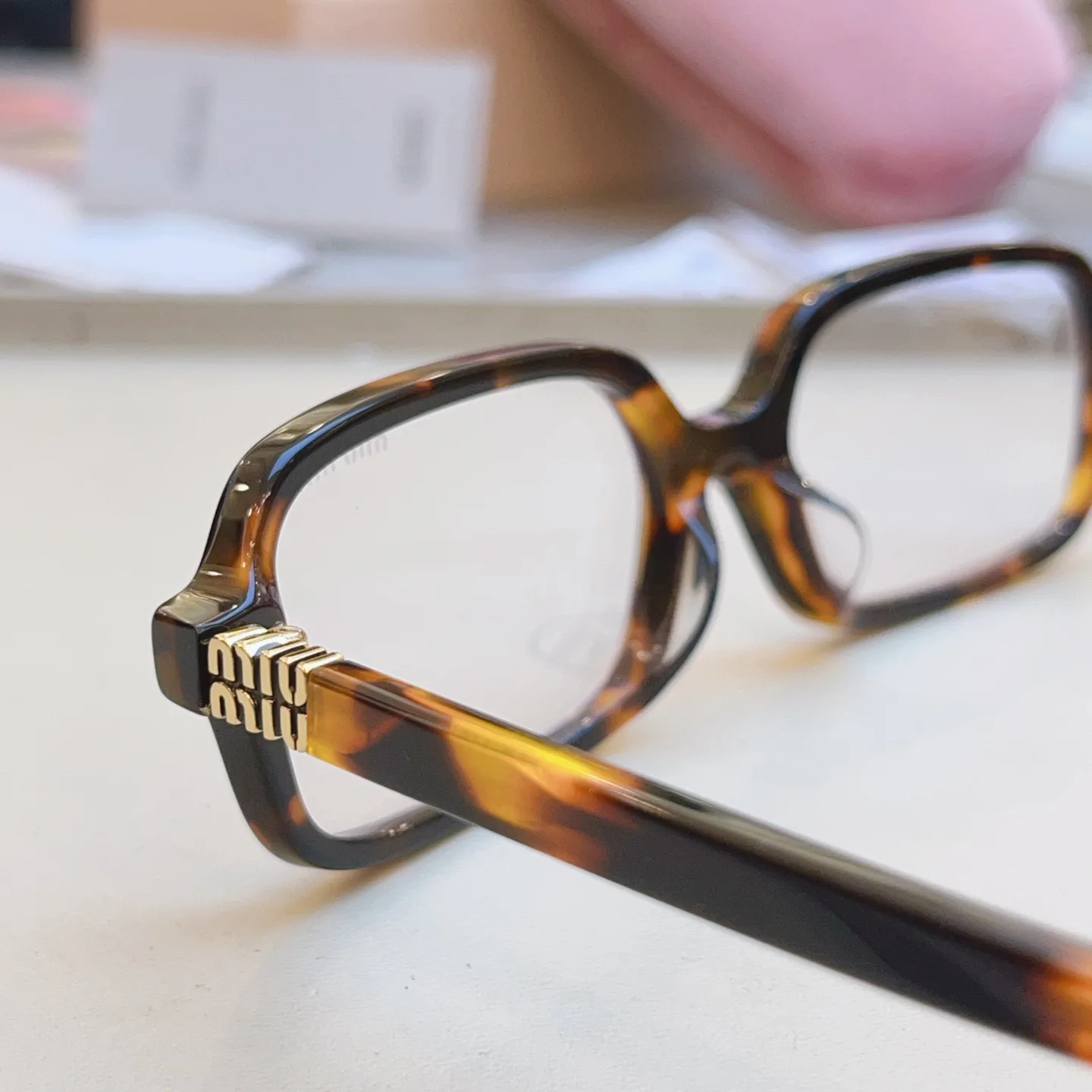 Glasses MIU MIU 17529370