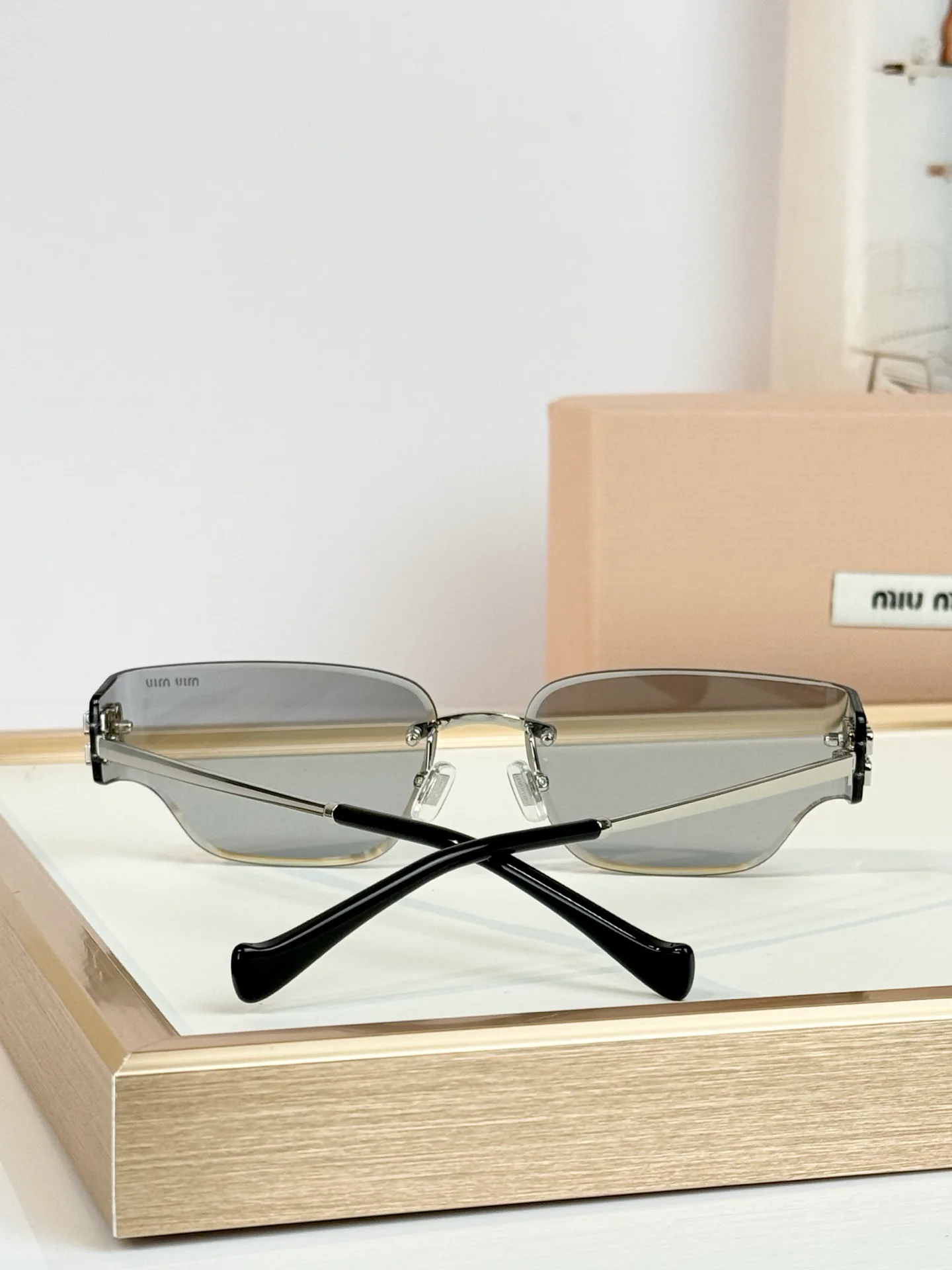 Glasses MIU MIU 18118082