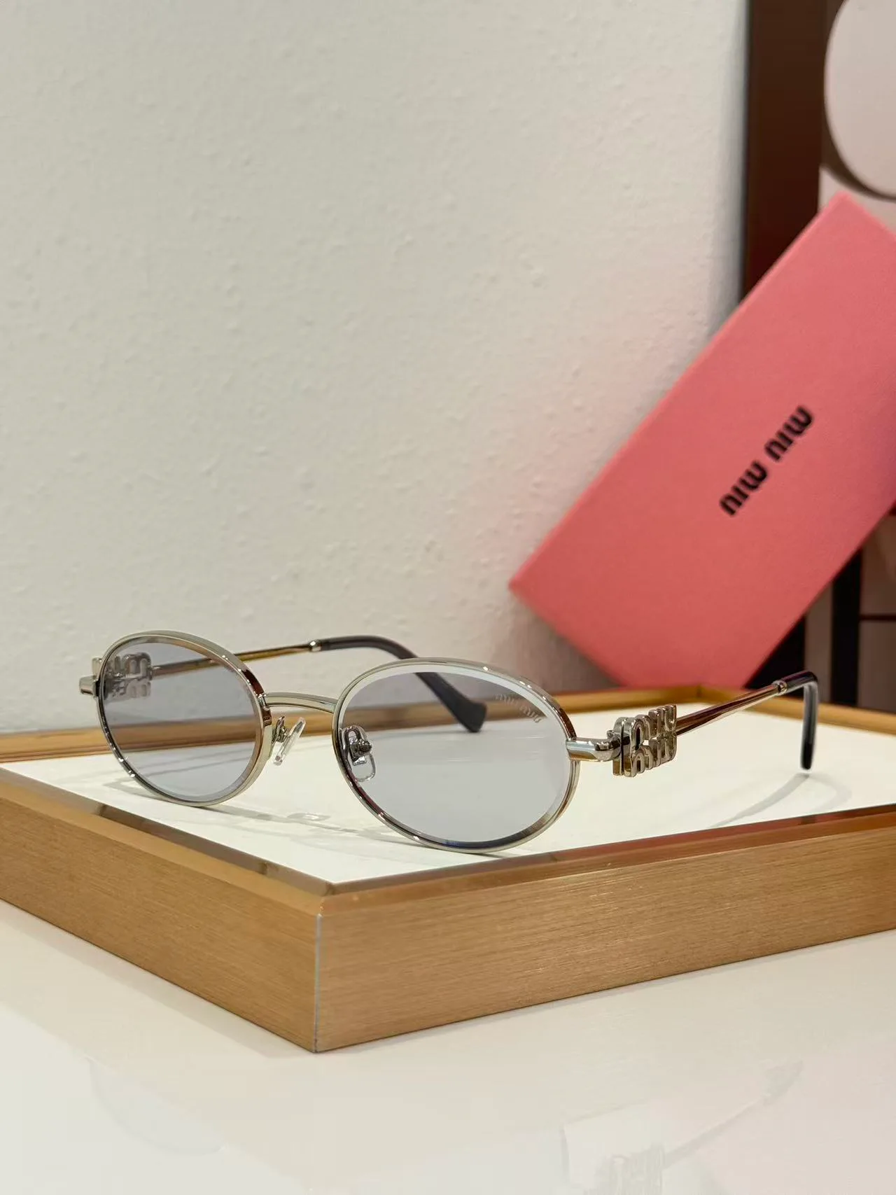Glasses MIU MIU 18226204