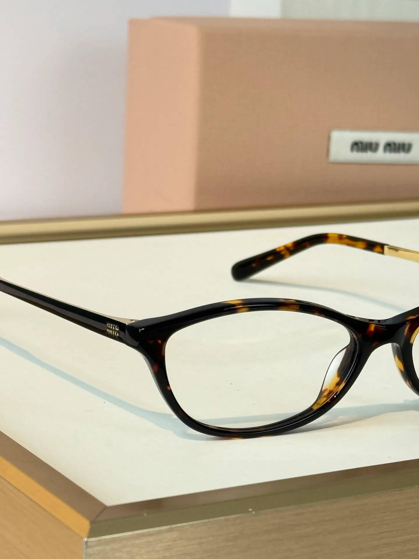 Glasses MIU MIU 18118192