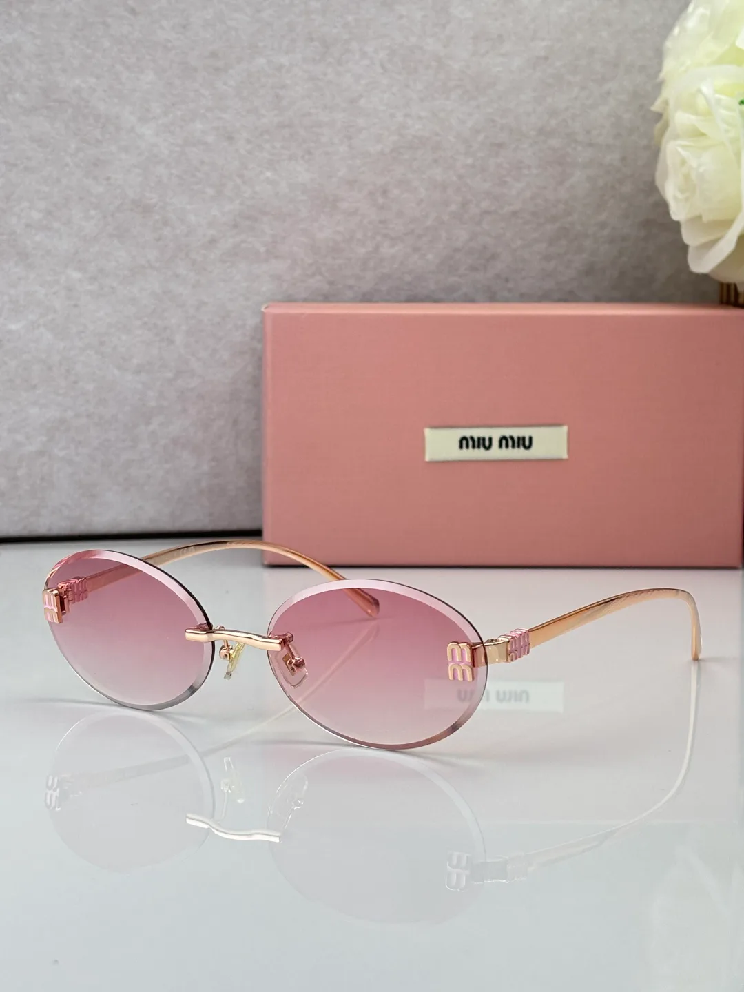 Glasses MIU MIU 18527878