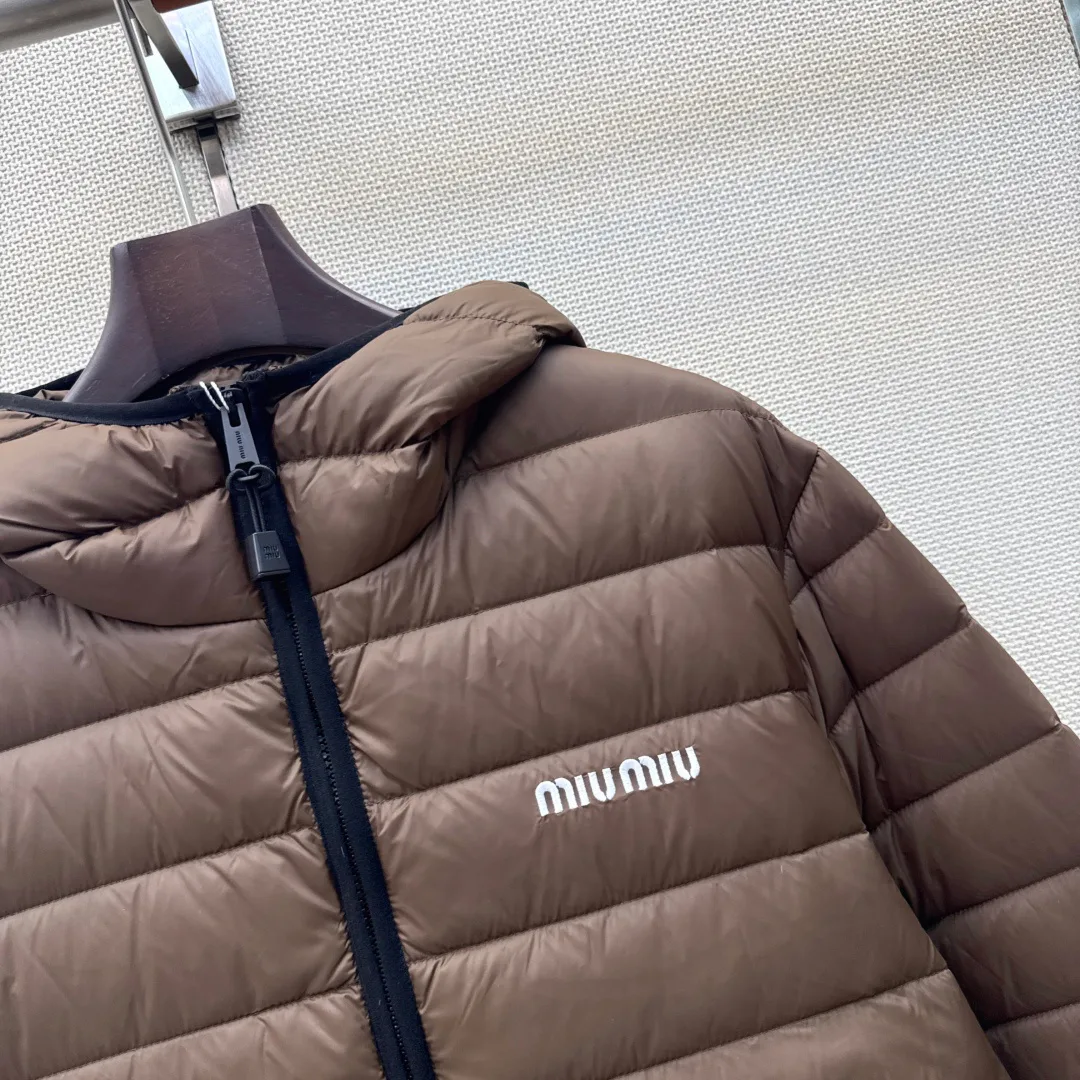 Women's Jackets And Down Jackets MIU MIU 18398187