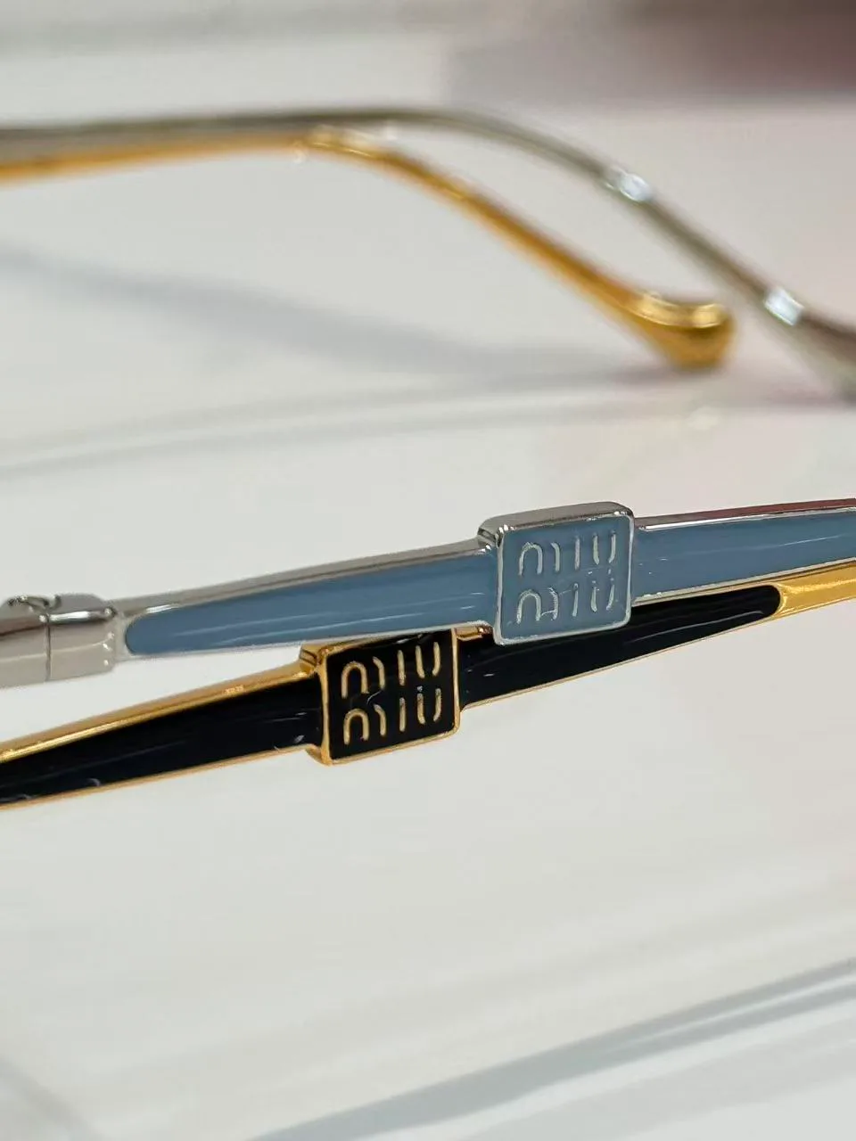 Glasses MIU MIU 17865310
