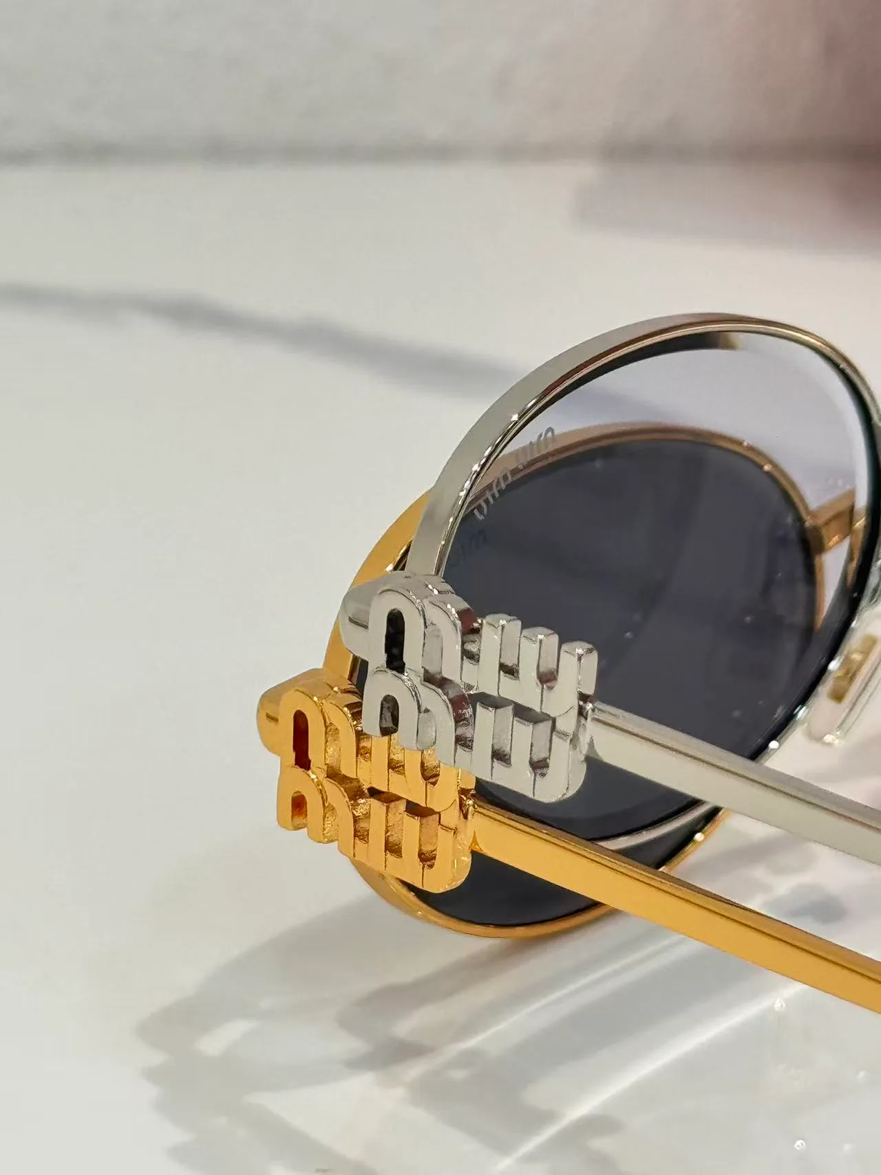 Glasses MIU MIU 18226204