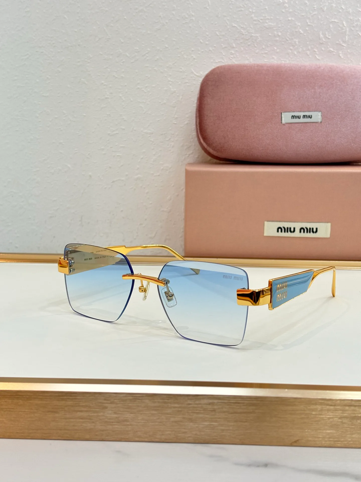 Glasses MIU MIU 18325671