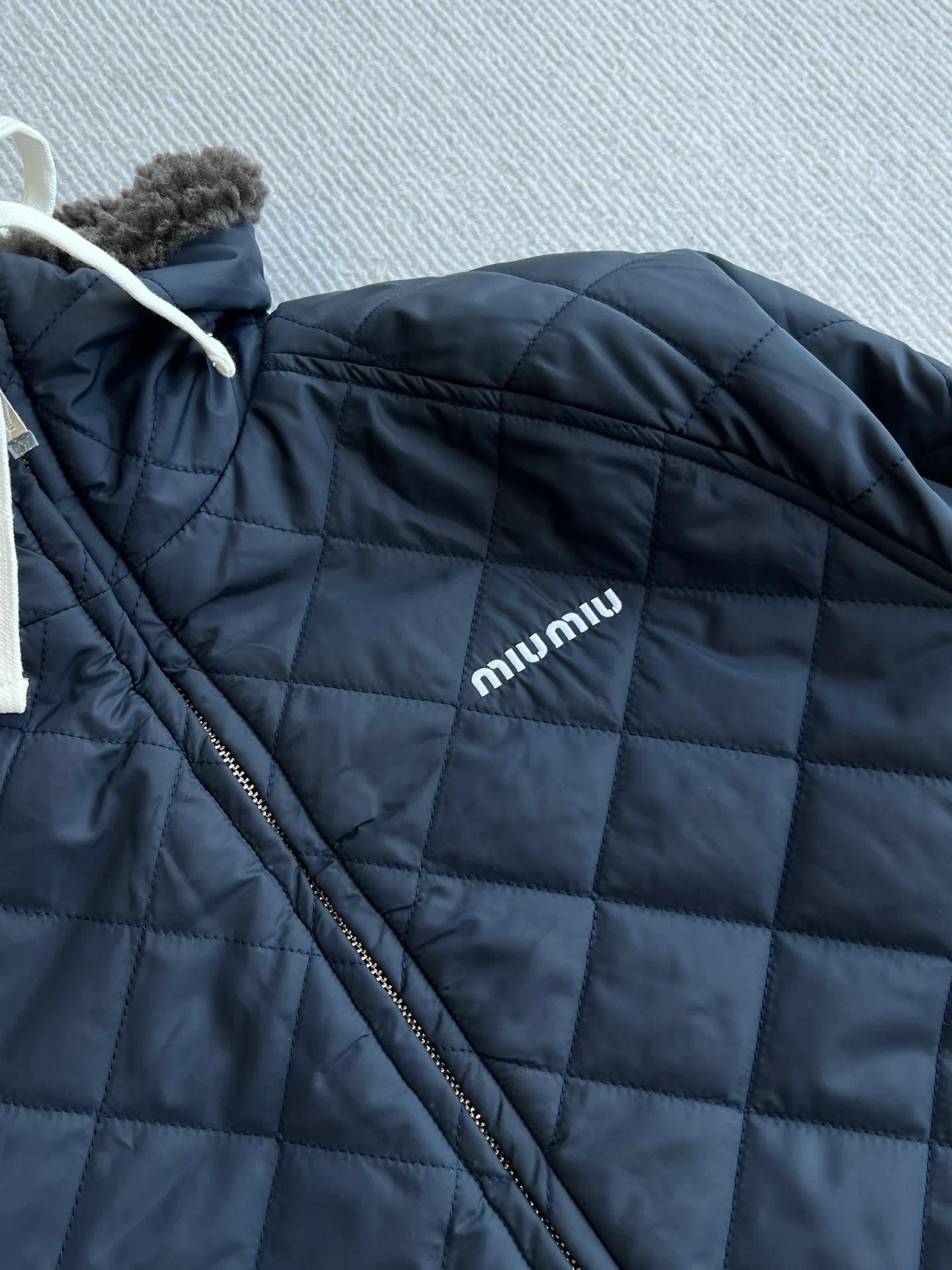 Women's Jackets And Down Jackets MIU MIU 18046821