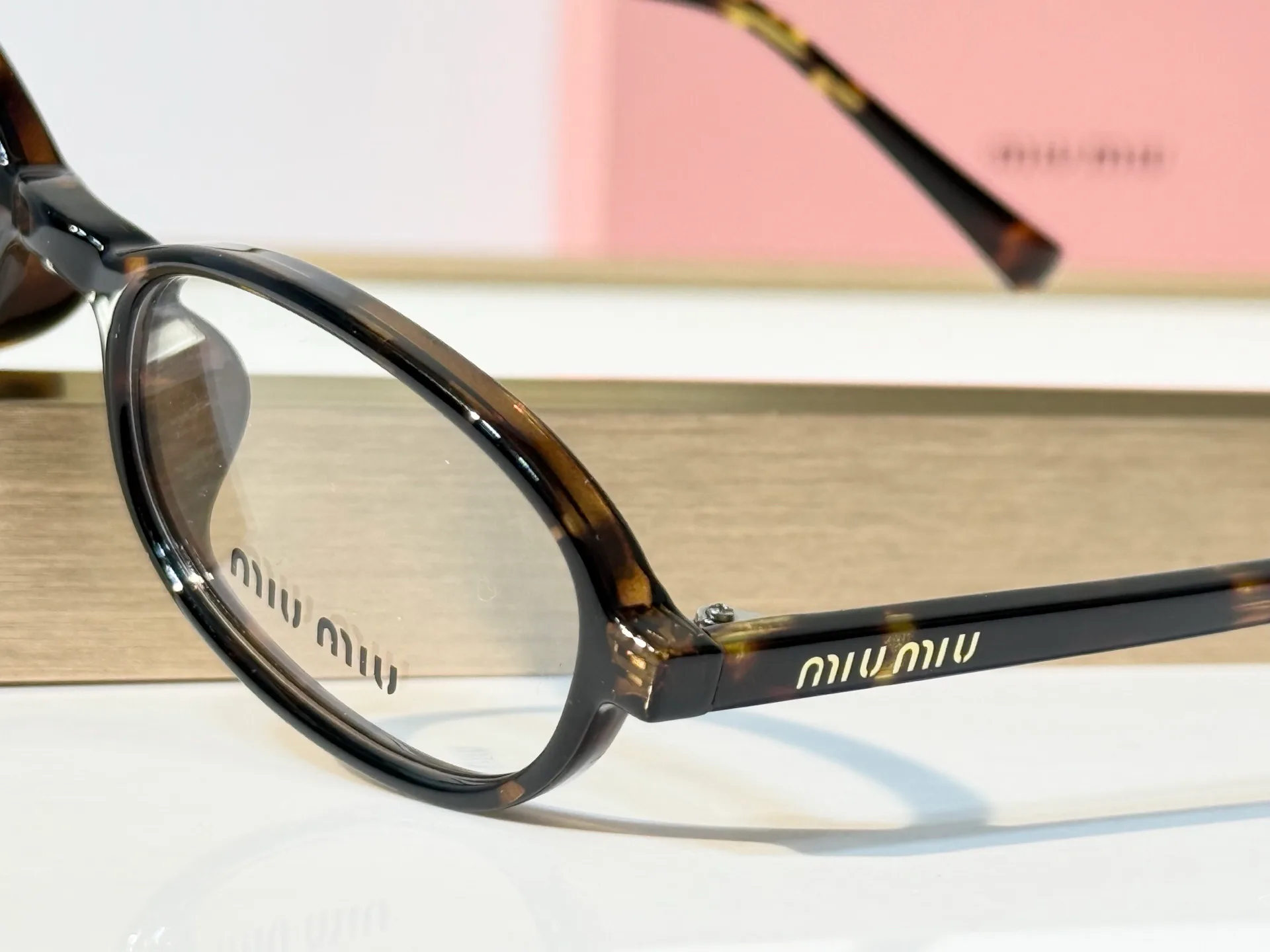 Glasses MIU MIU 18117607