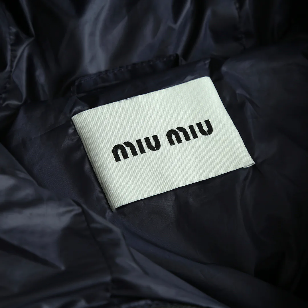 Women's Jackets And Down Jackets MIU MIU 18439542