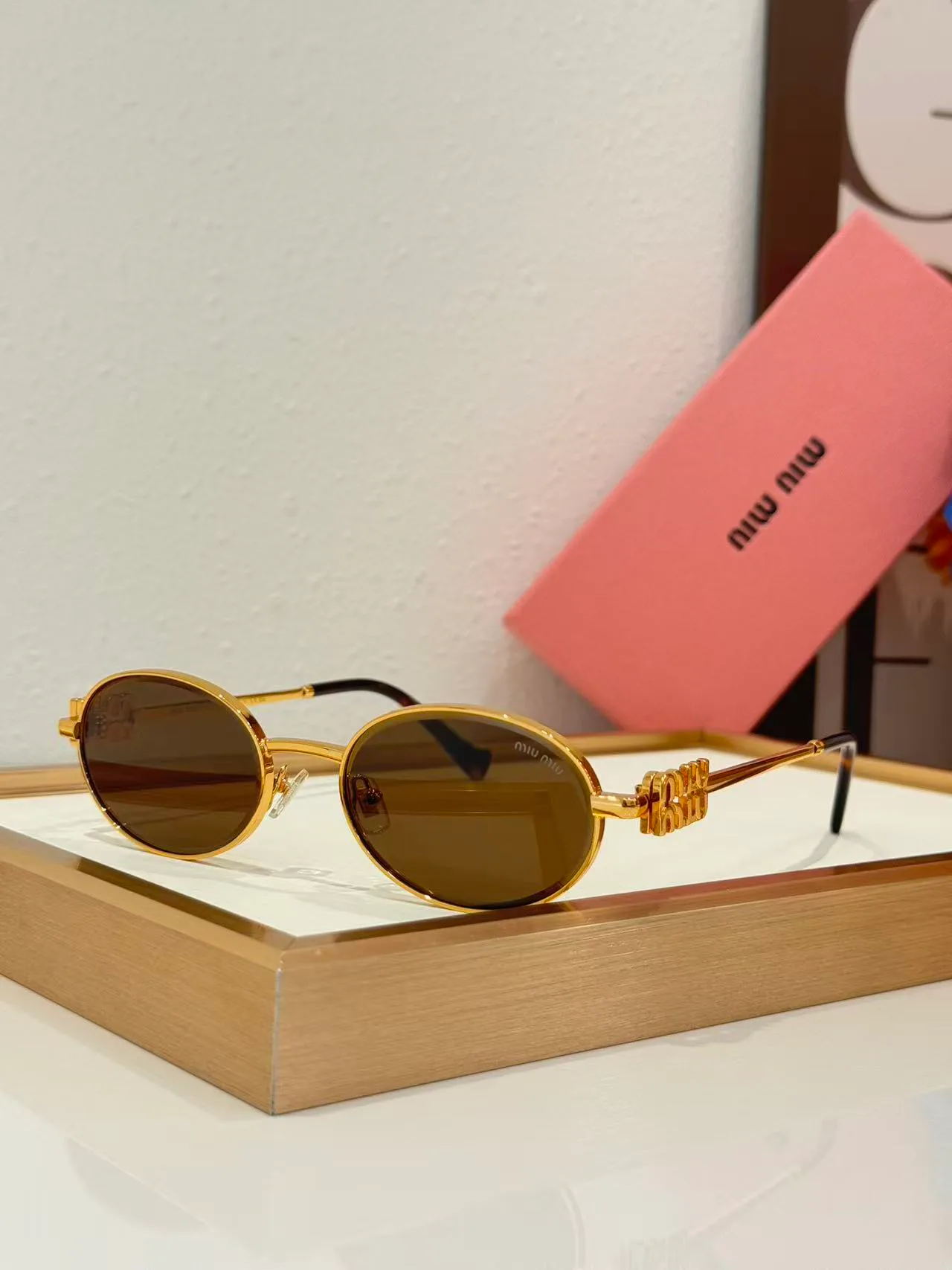 Glasses MIU MIU 18226204