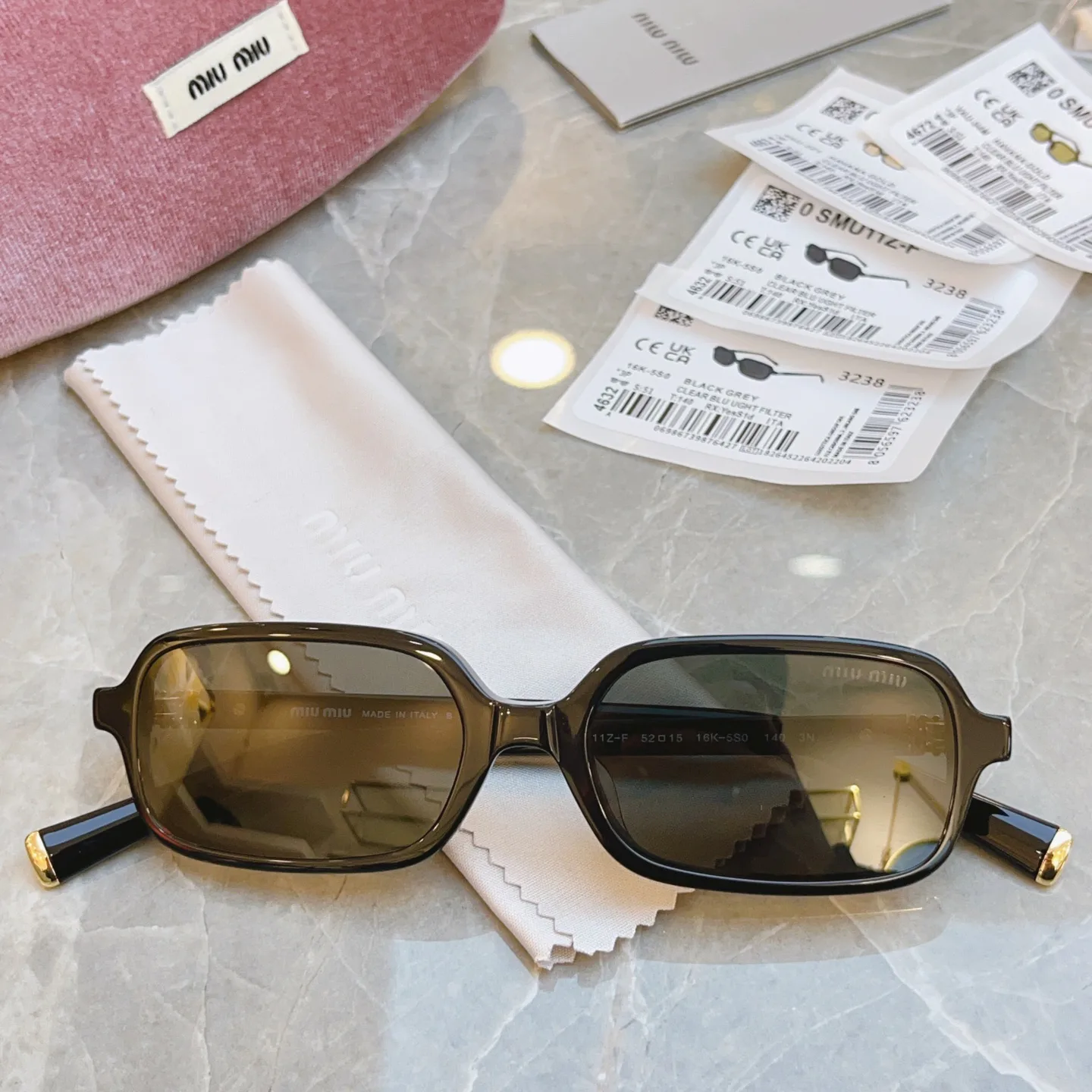 Glasses MIU MIU 17529369