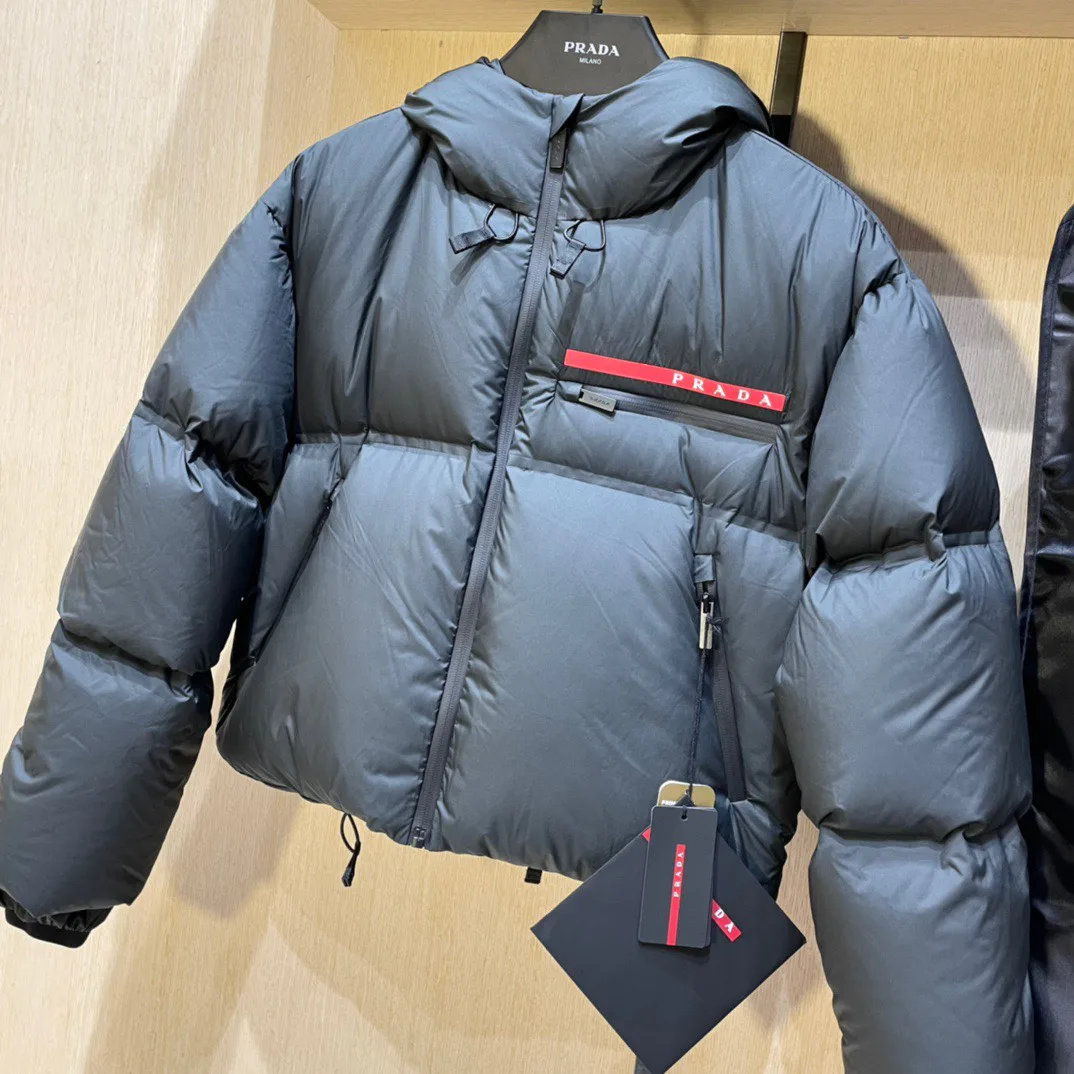 Women's Jackets And Down Jackets PRADA 18133799