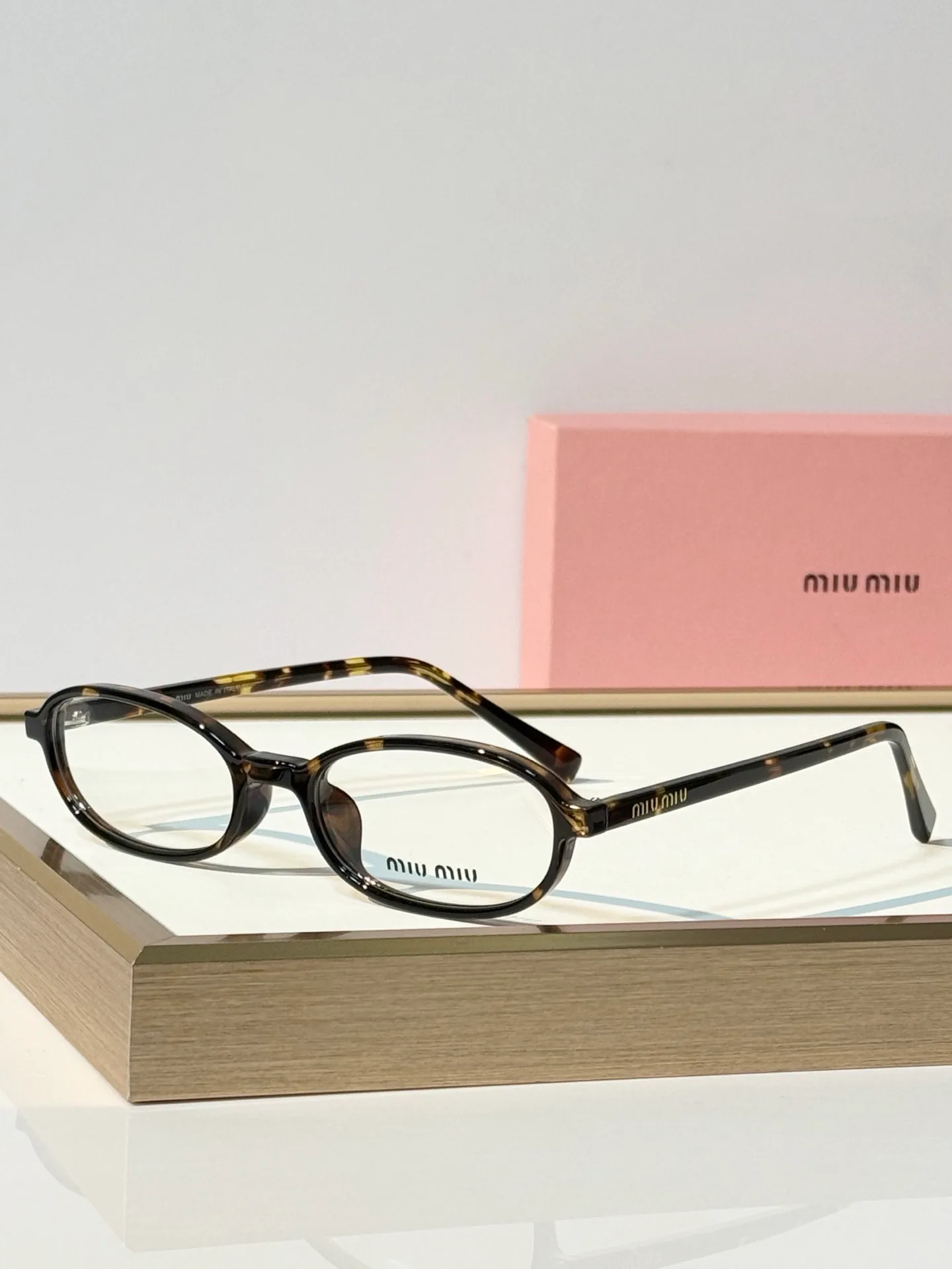 Glasses MIU MIU 18117608