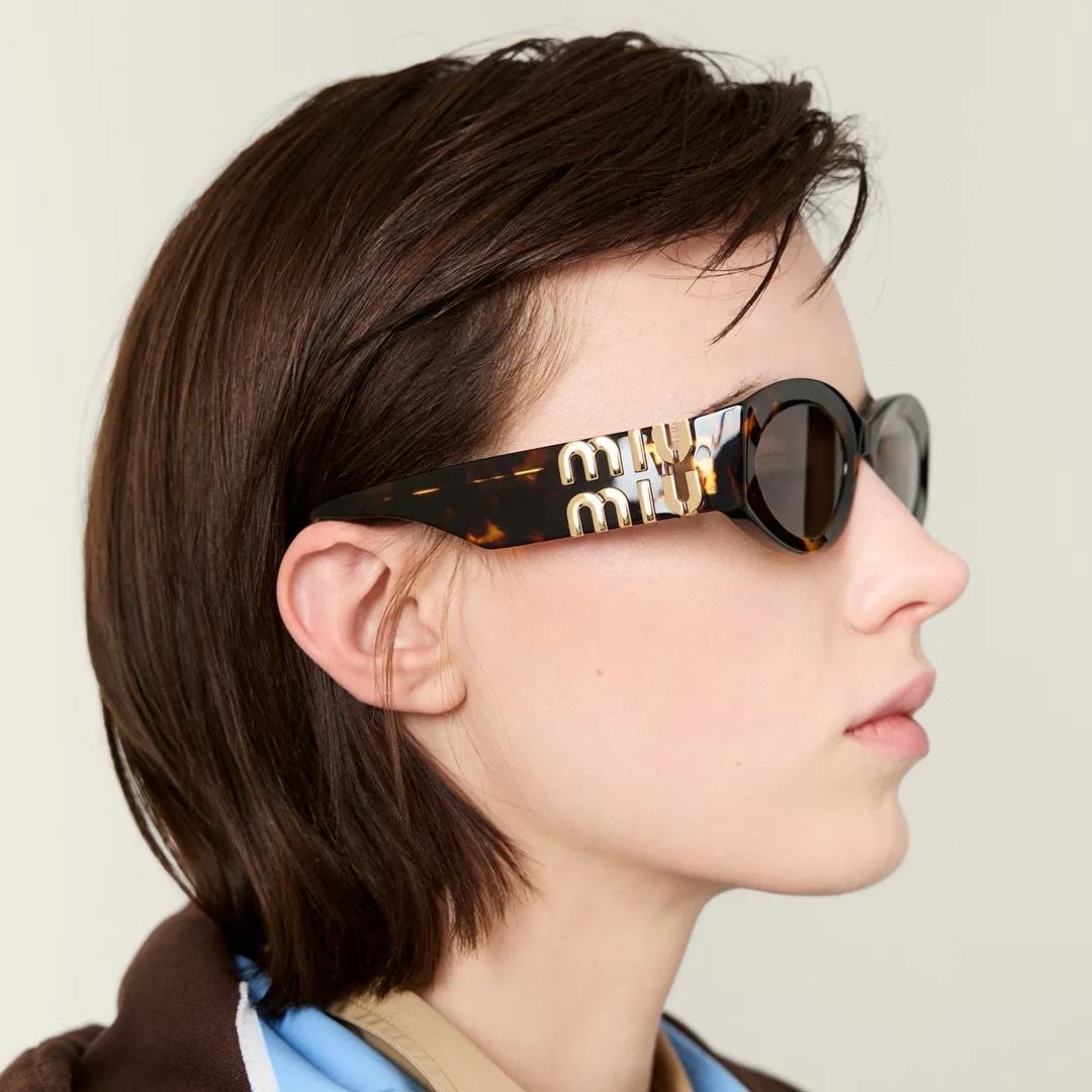 Glasses MIU MIU 17646786
