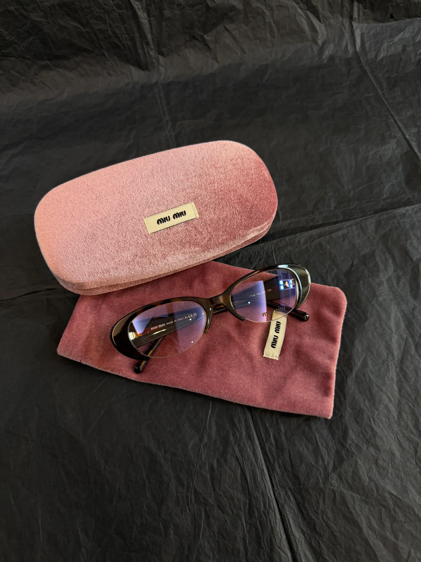 Glasses MIU MIU 18018796