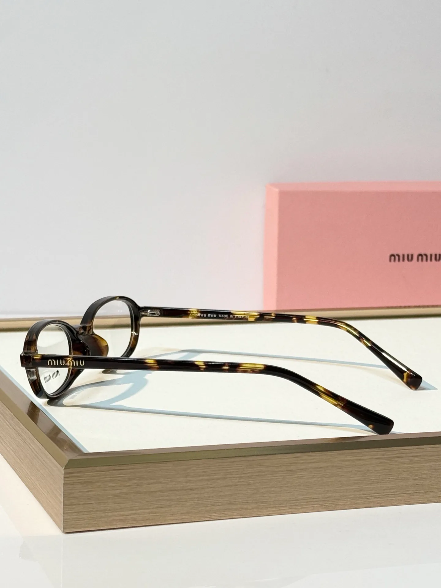 Glasses MIU MIU 18117607