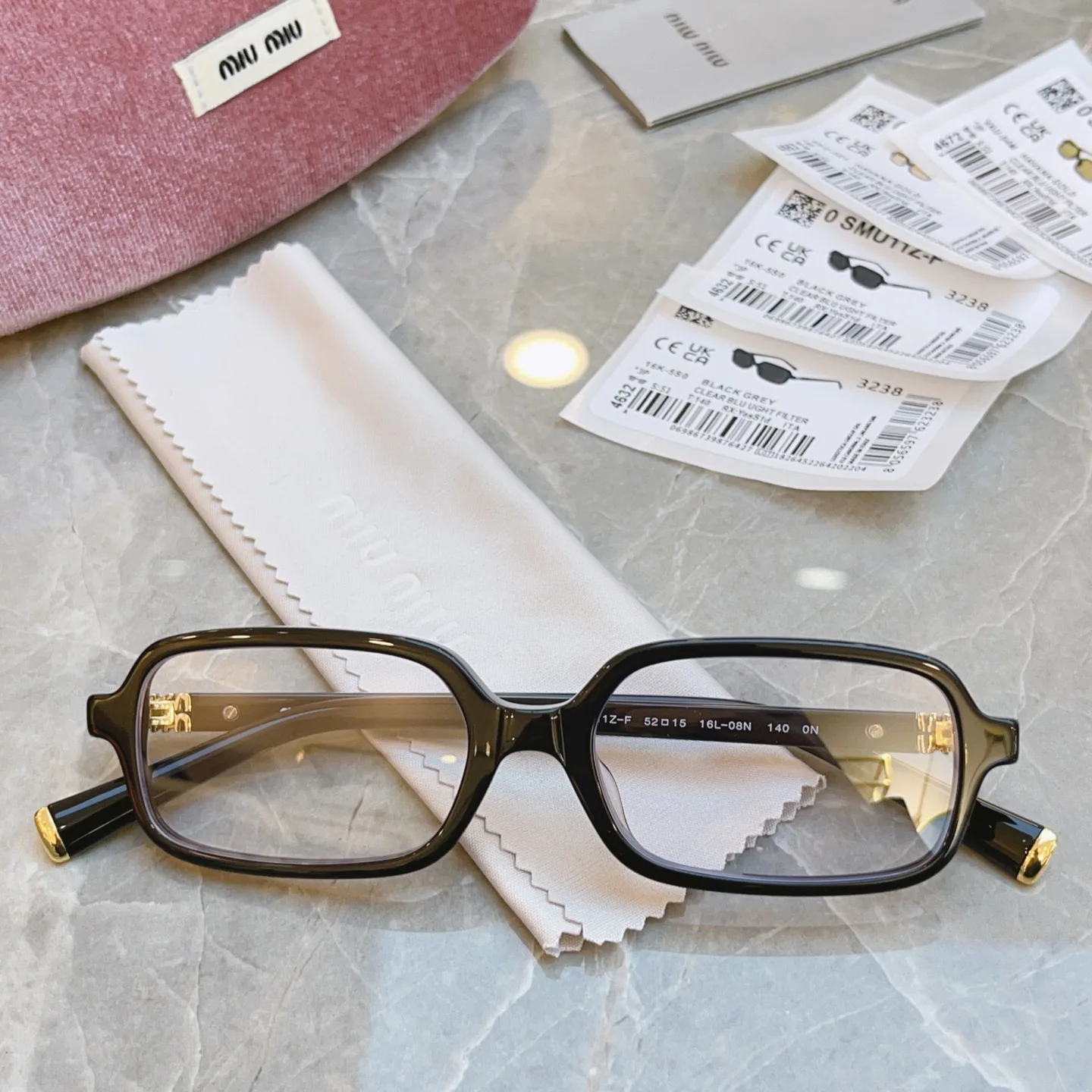 Glasses MIU MIU 17529369
