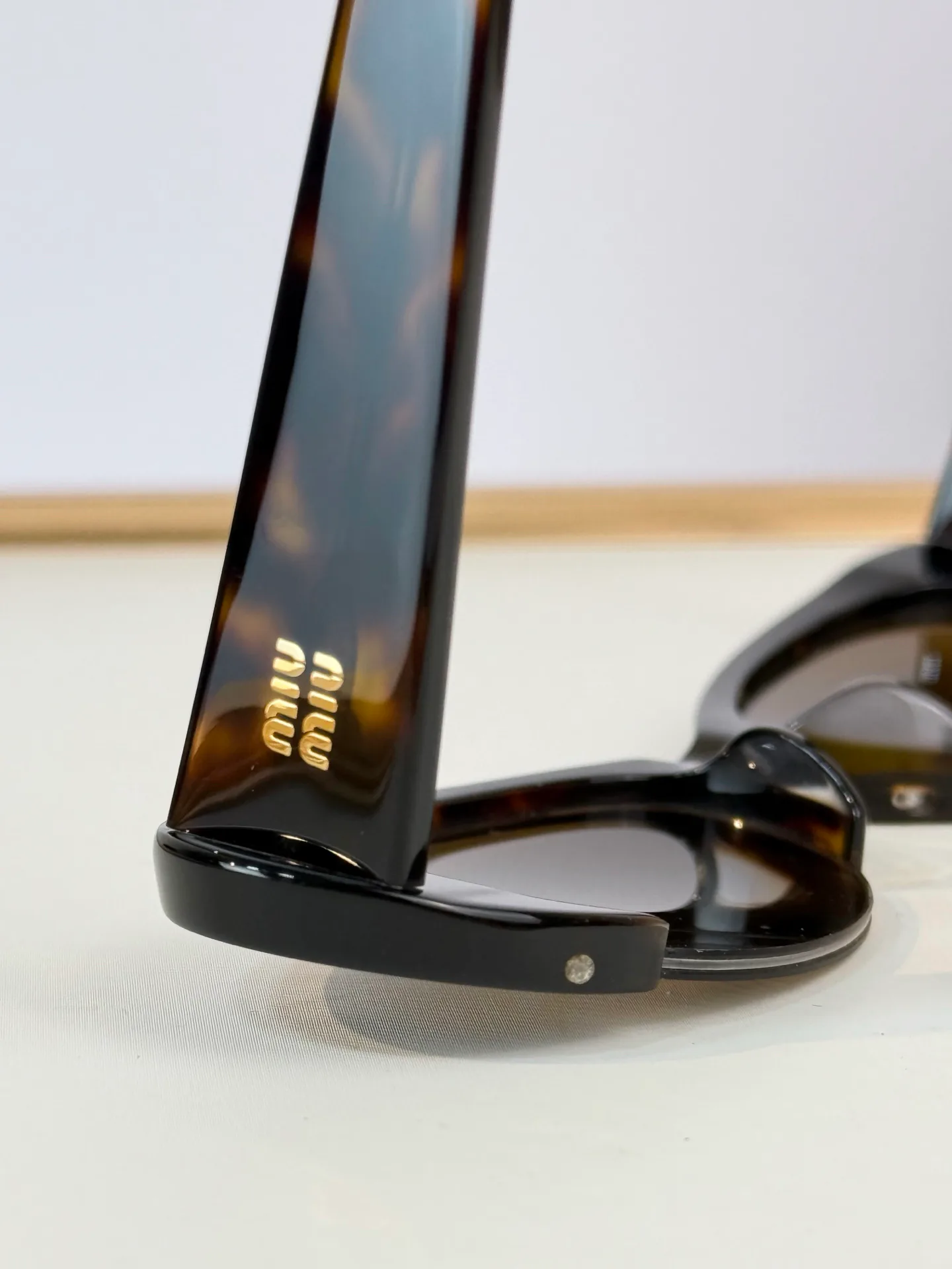 Glasses MIU MIU 18059896