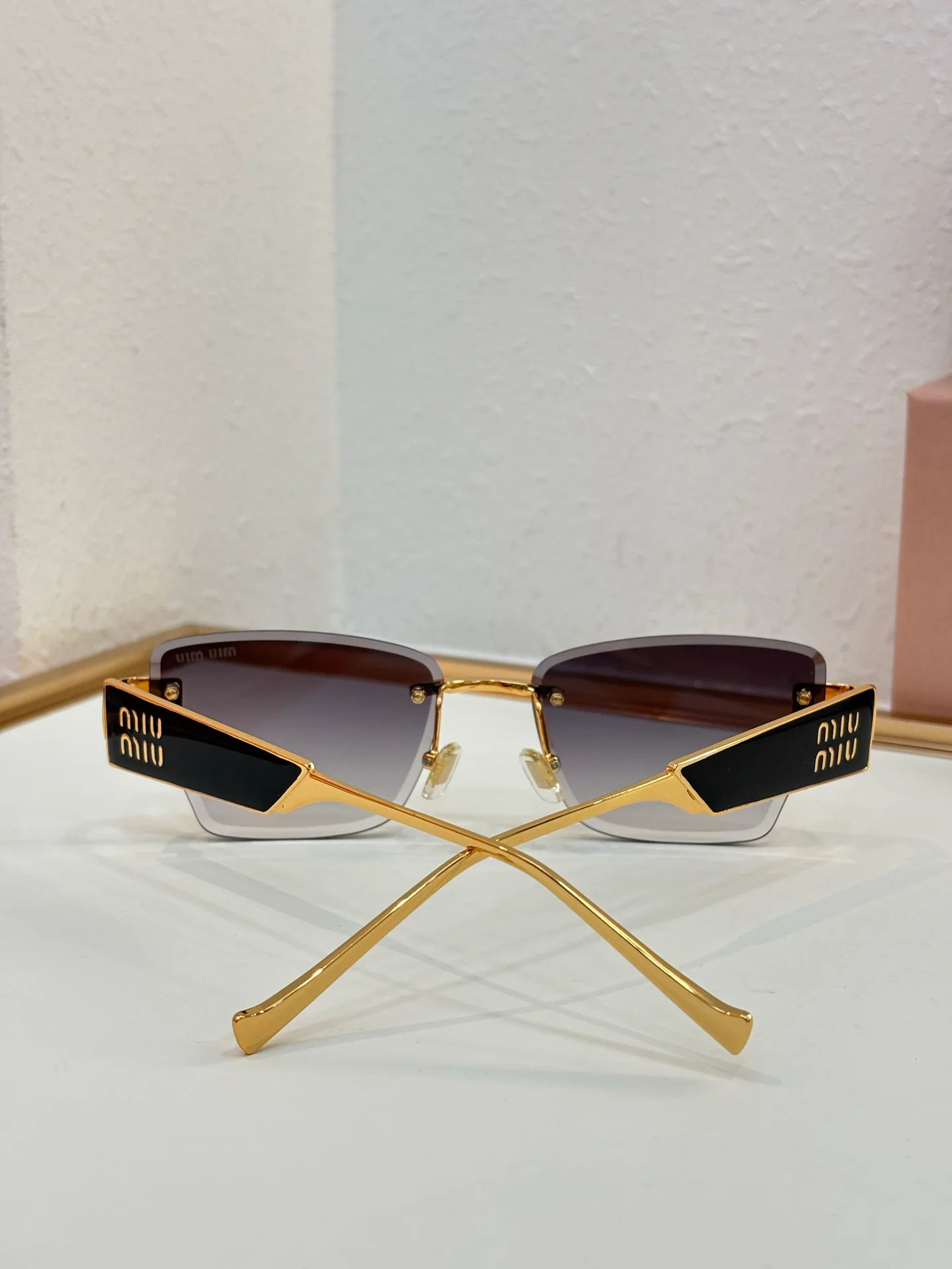 Glasses MIU MIU 18325670