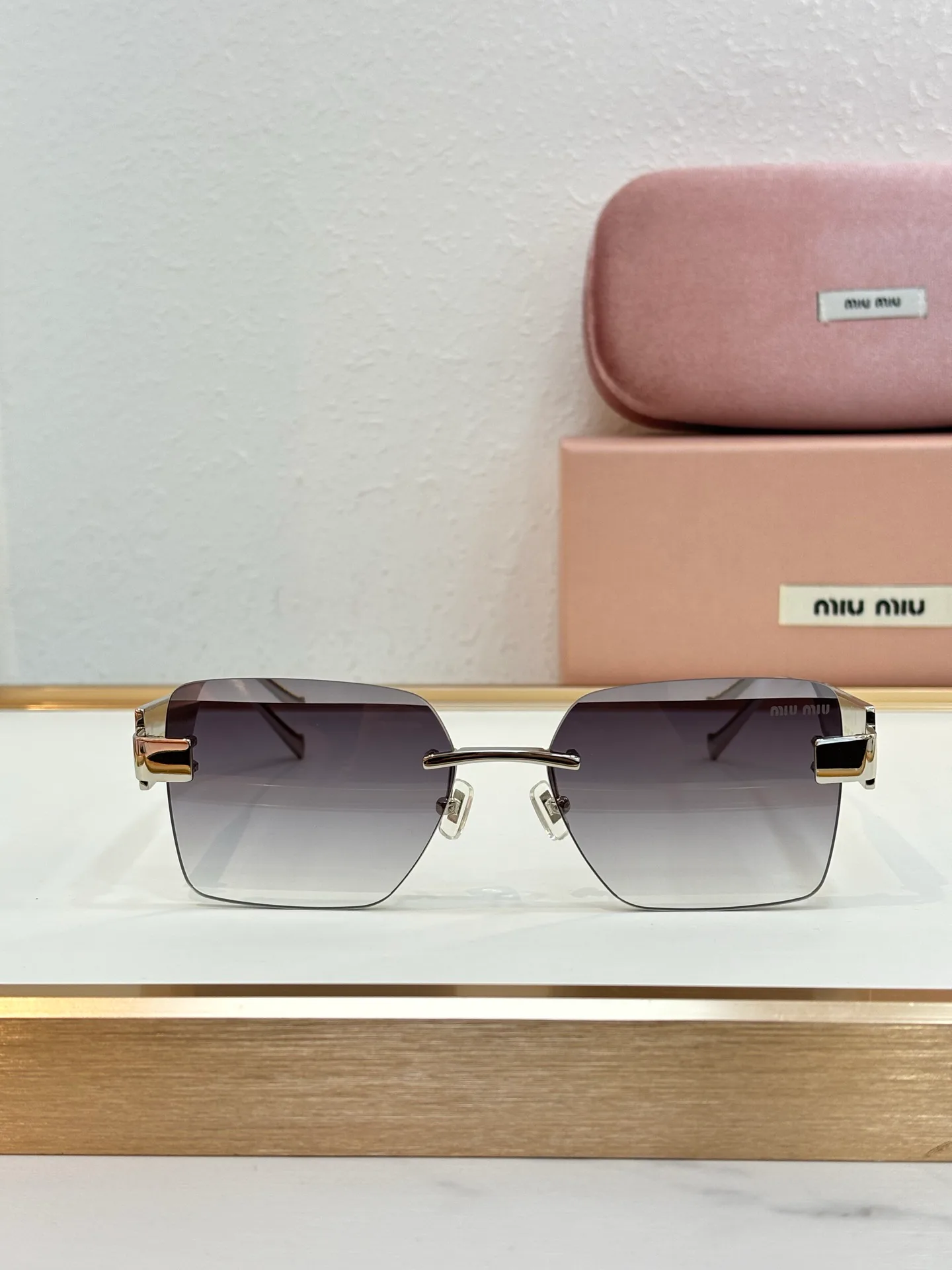 Glasses MIU MIU 18325671
