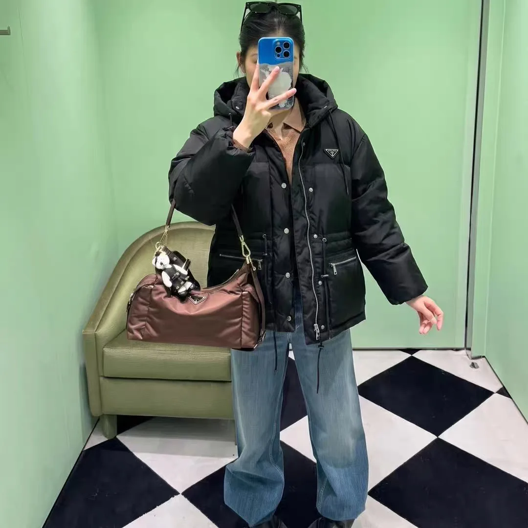 Women's Jackets And Down Jackets PRADA 18348170