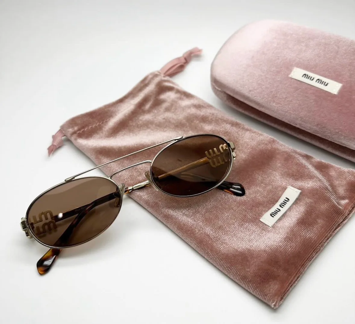 Glasses MIU MIU 18095002