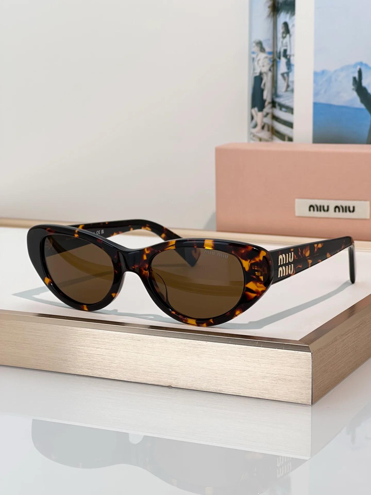 Glasses MIU MIU 17565428
