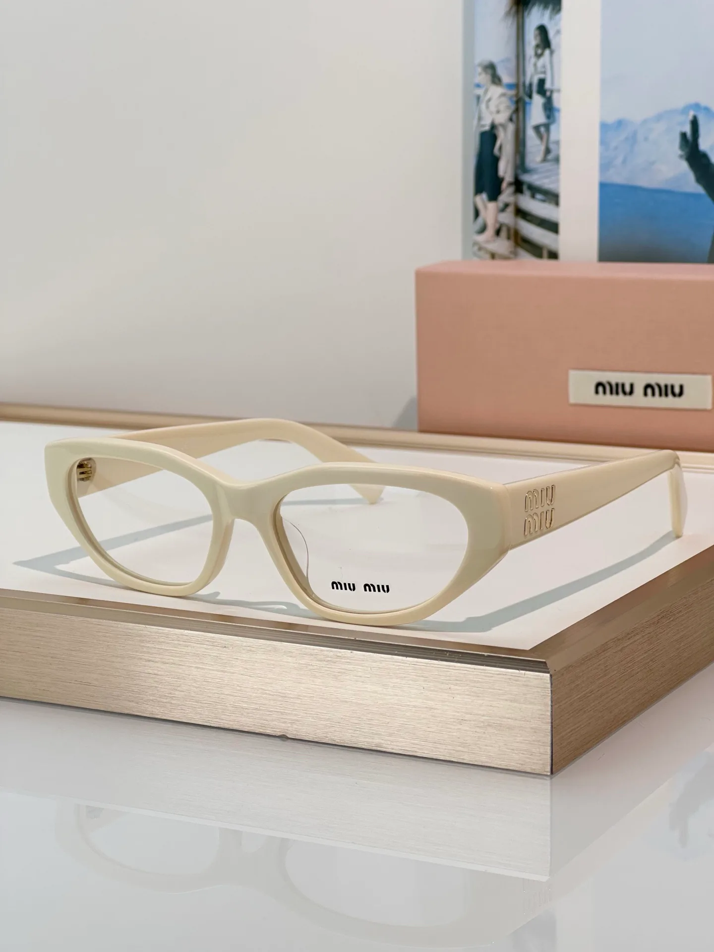 Glasses MIU MIU 17565440