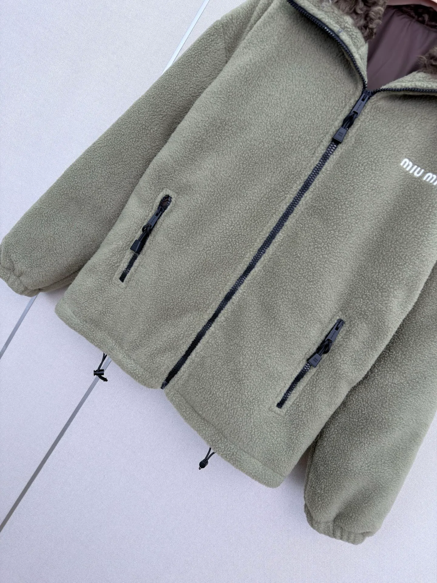 Women's Jackets And Down Jackets MIU MIU 18023005
