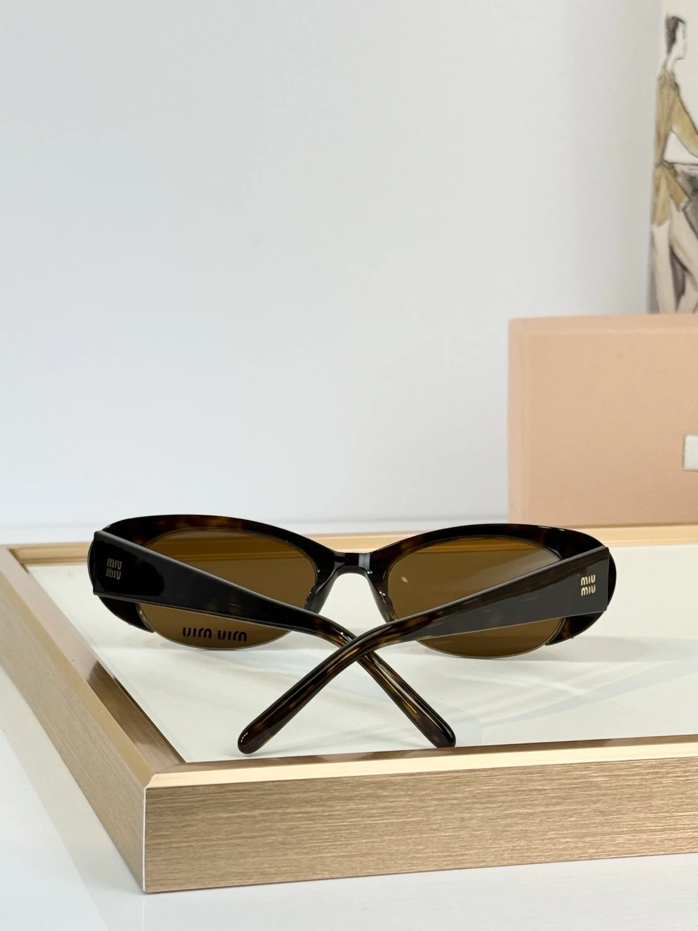 Glasses MIU MIU 18059896