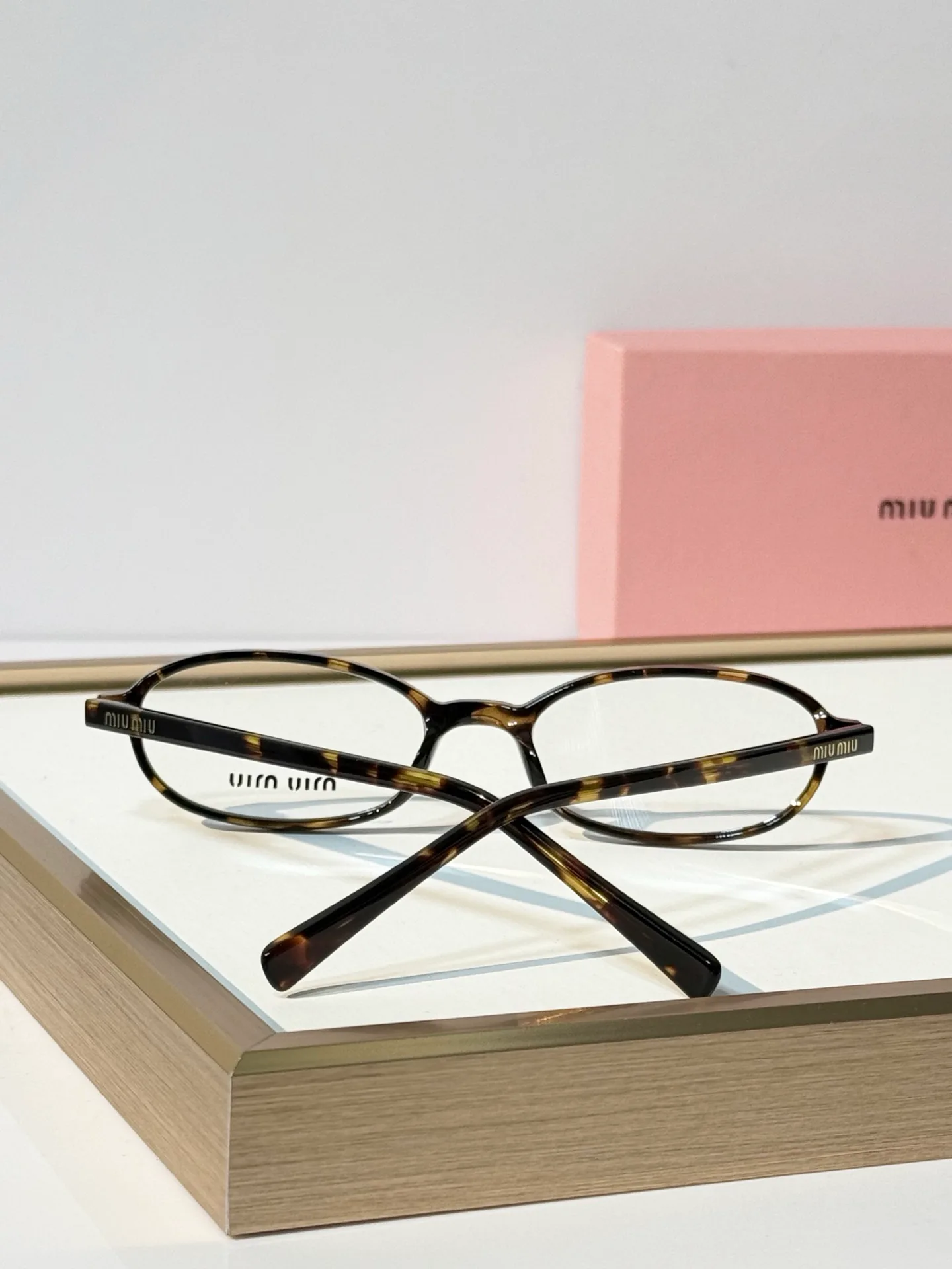 Glasses MIU MIU 18117607
