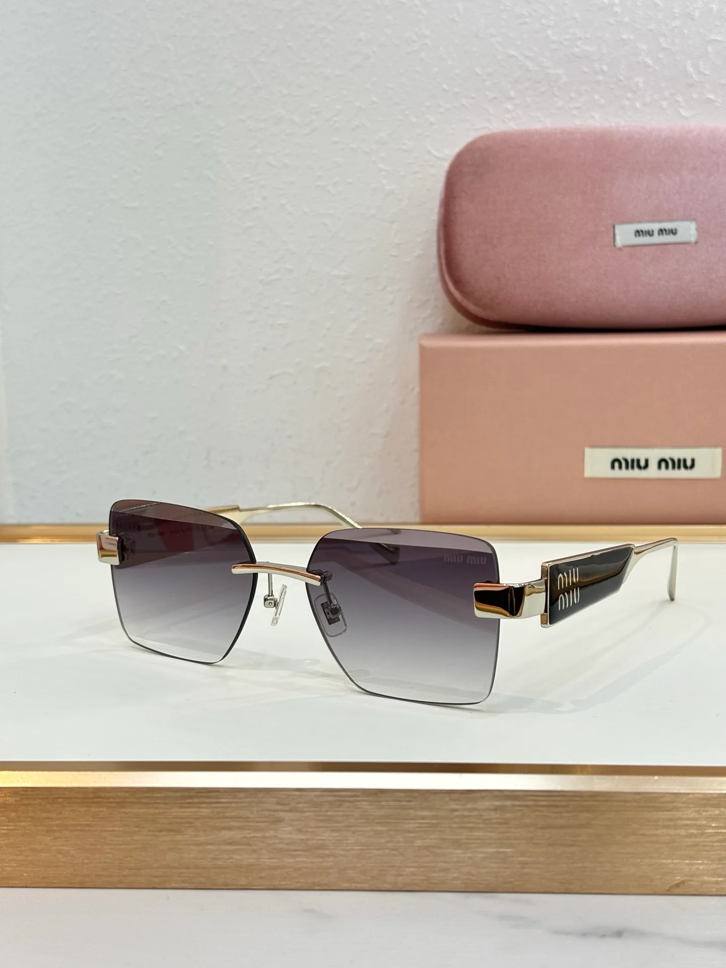 Glasses MIU MIU 18325671