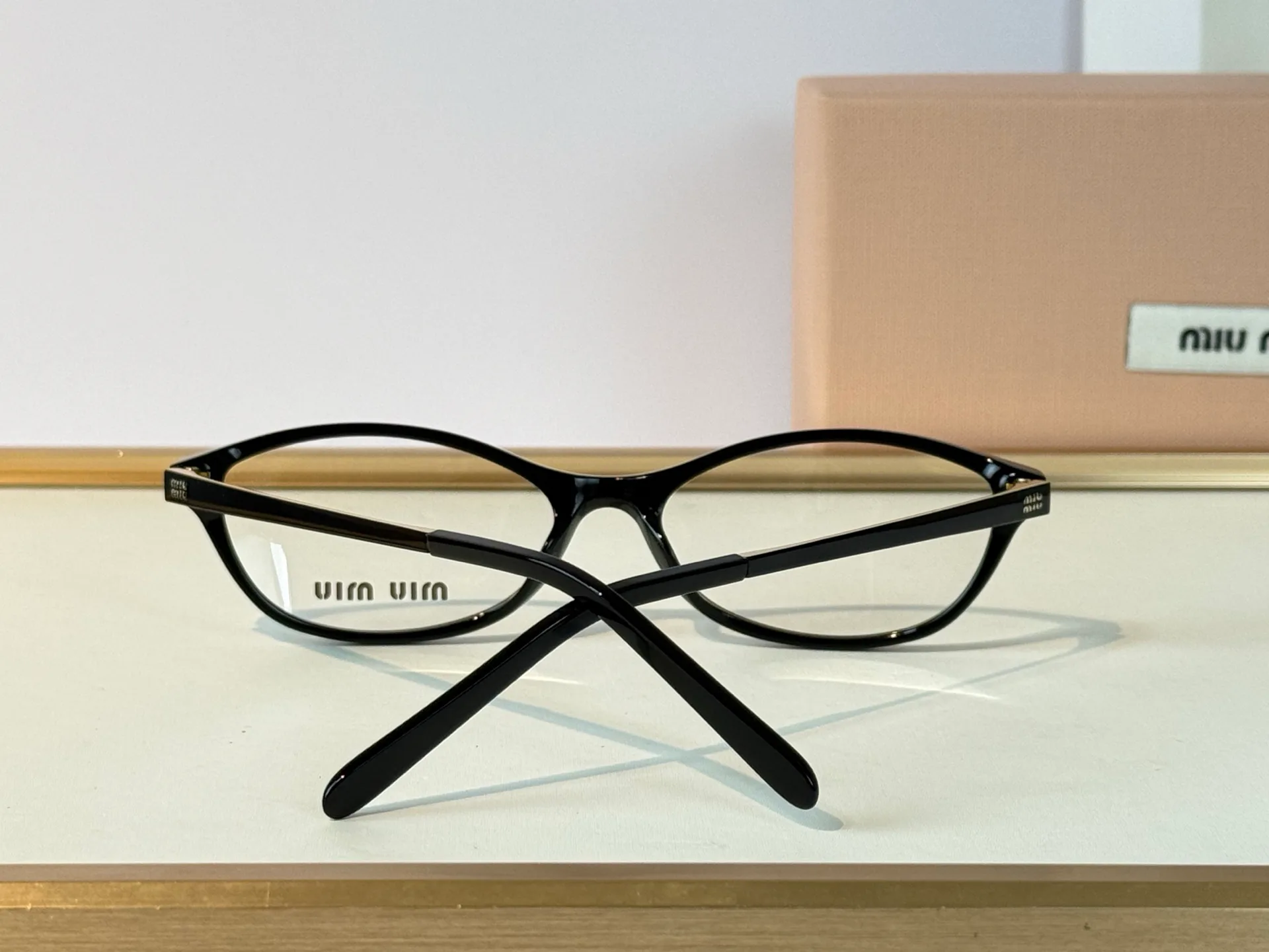 Glasses MIU MIU 18118192