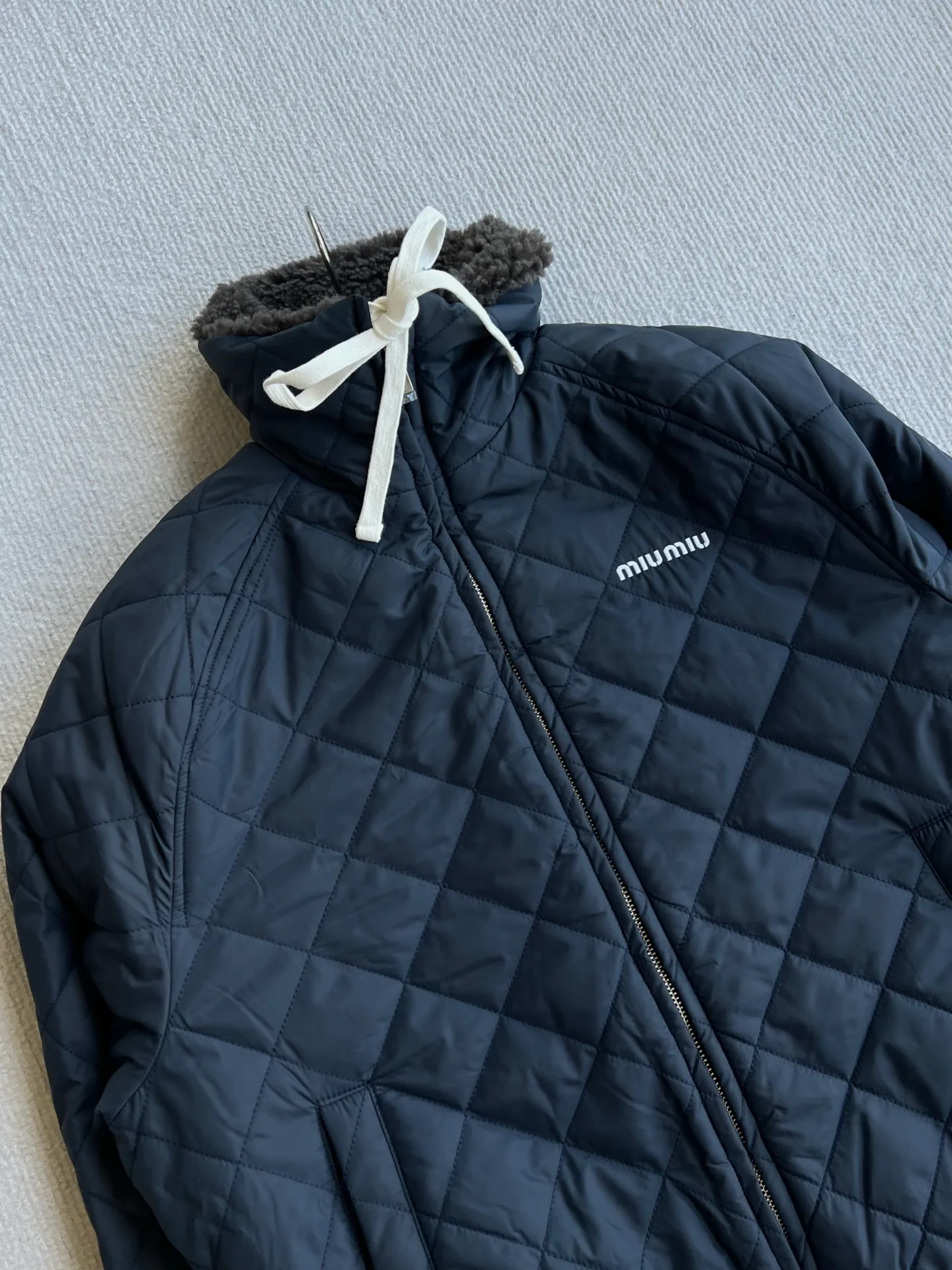 Women's Jackets And Down Jackets MIU MIU 18046821
