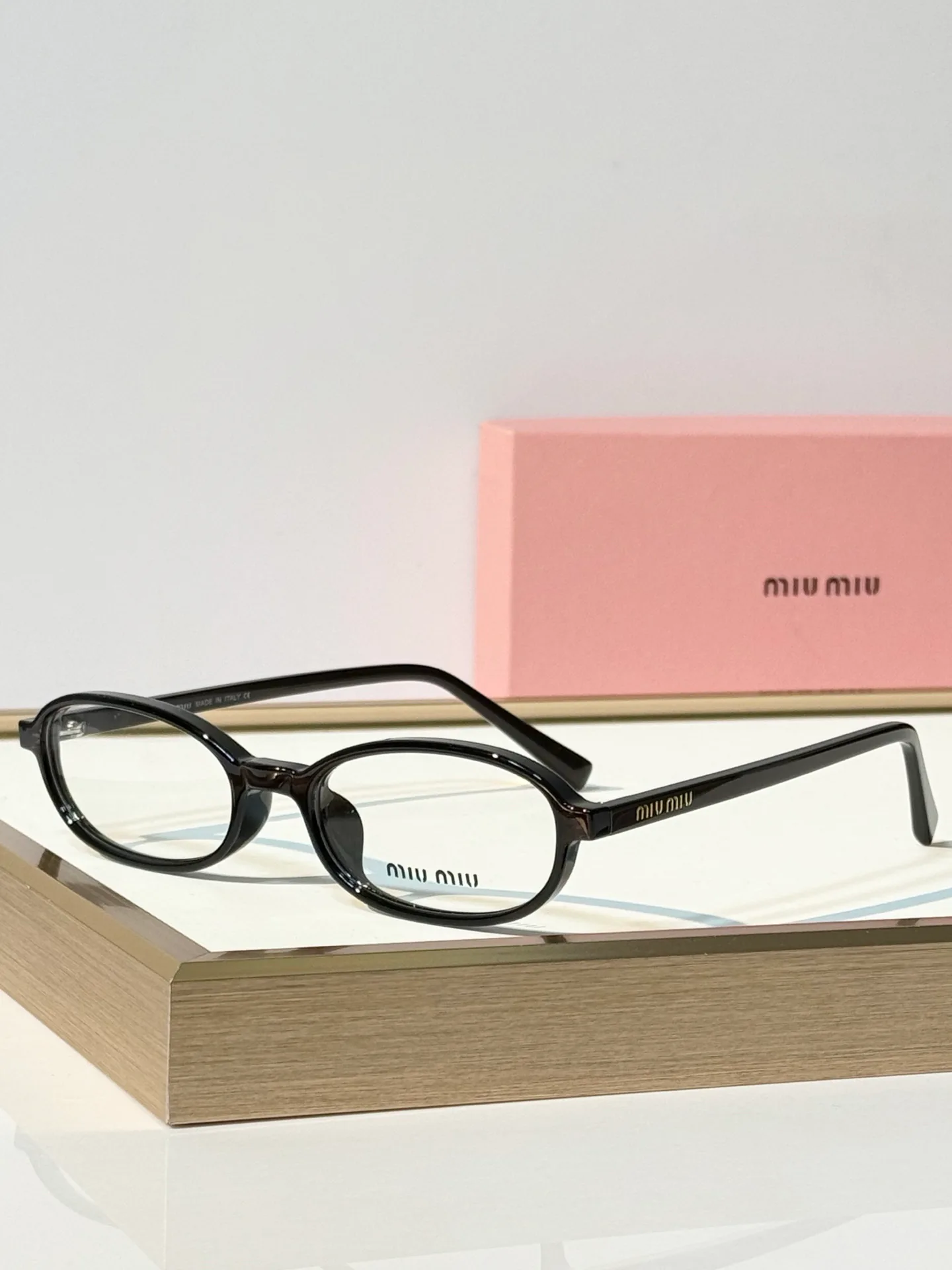 Glasses MIU MIU 18117608