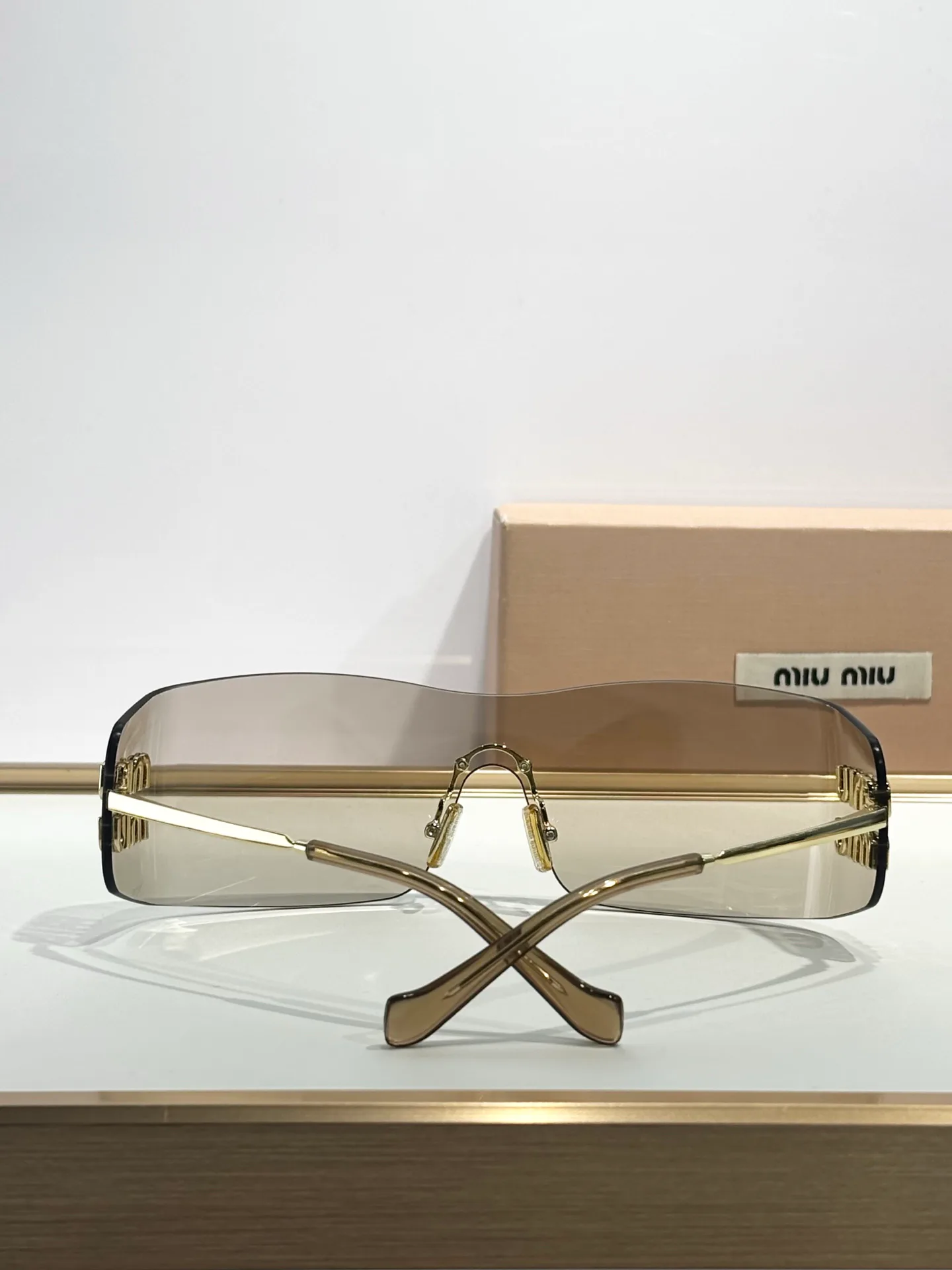 Glasses MIU MIU 17649641