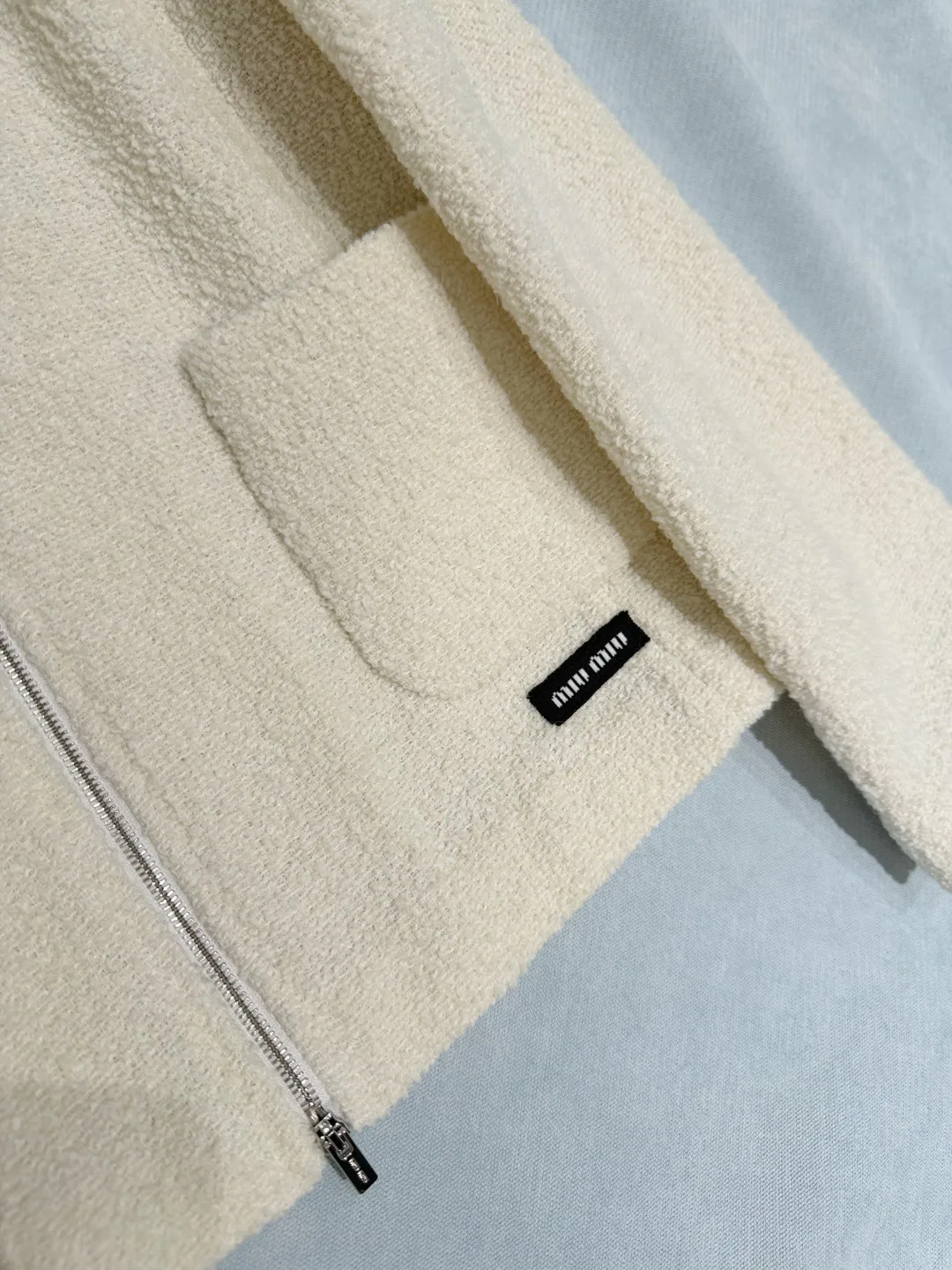 Women's Jackets And Down Jackets MIU MIU 18049813