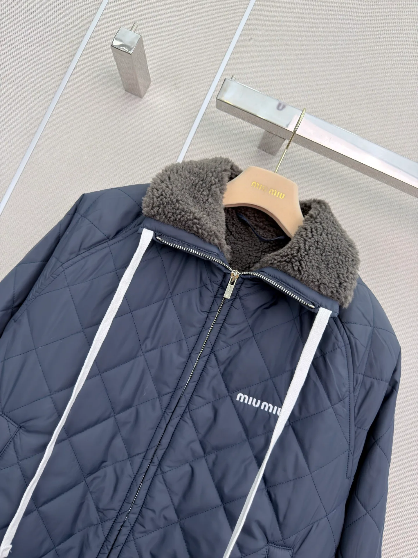 Women's Jackets And Down Jackets MIU MIU 18023482