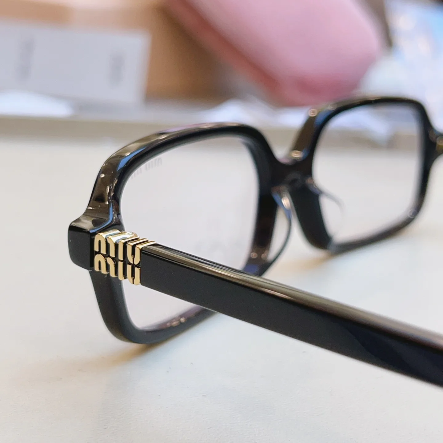 Glasses MIU MIU 17529370
