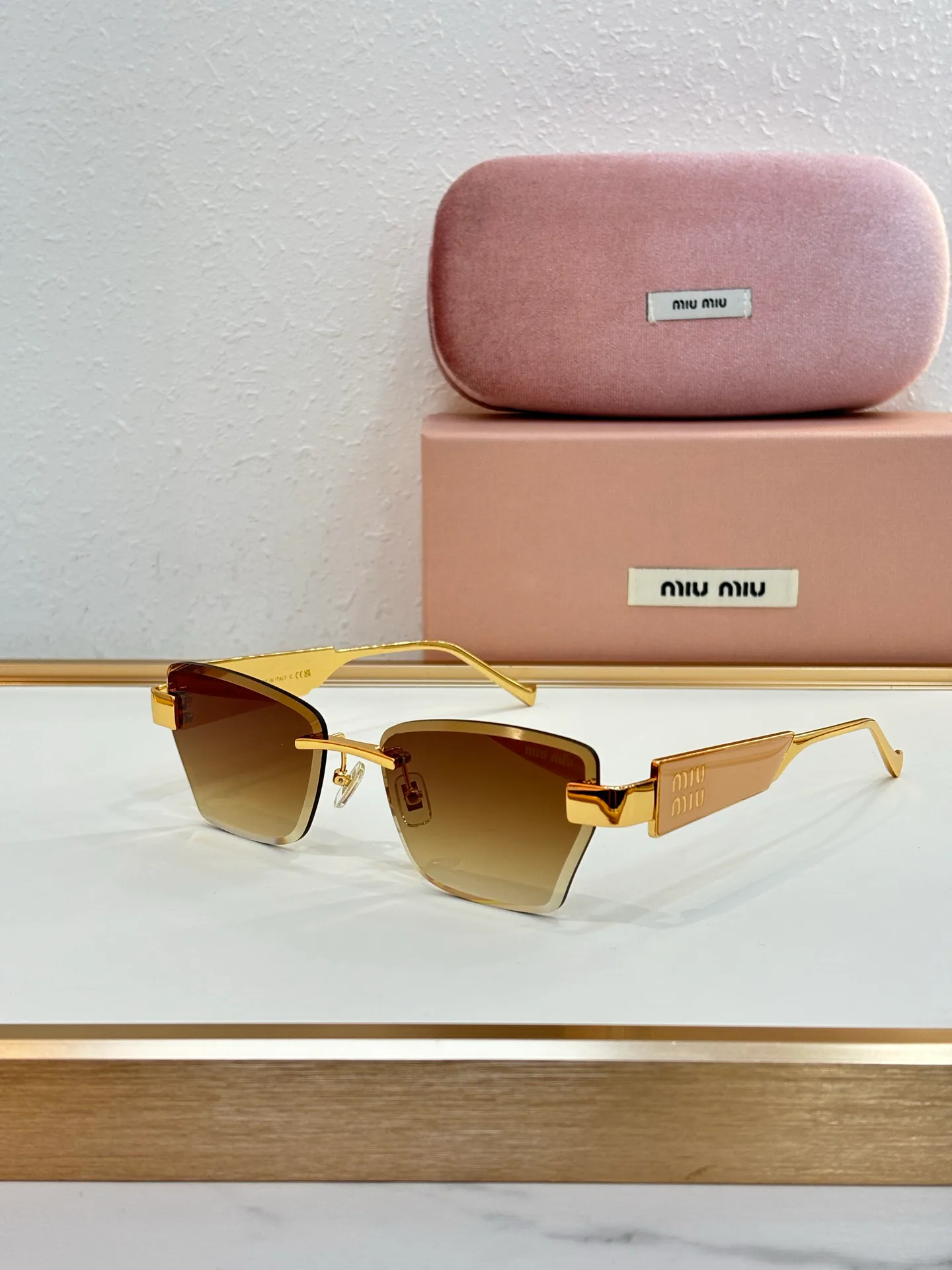 Glasses MIU MIU 18325670
