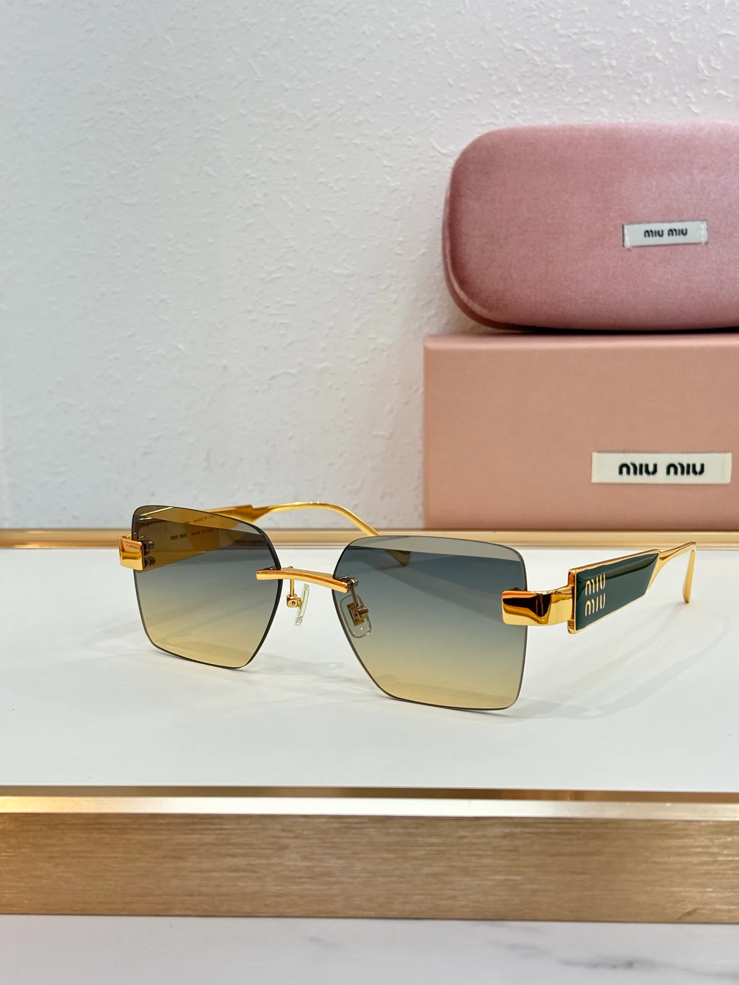 Glasses MIU MIU 18325671