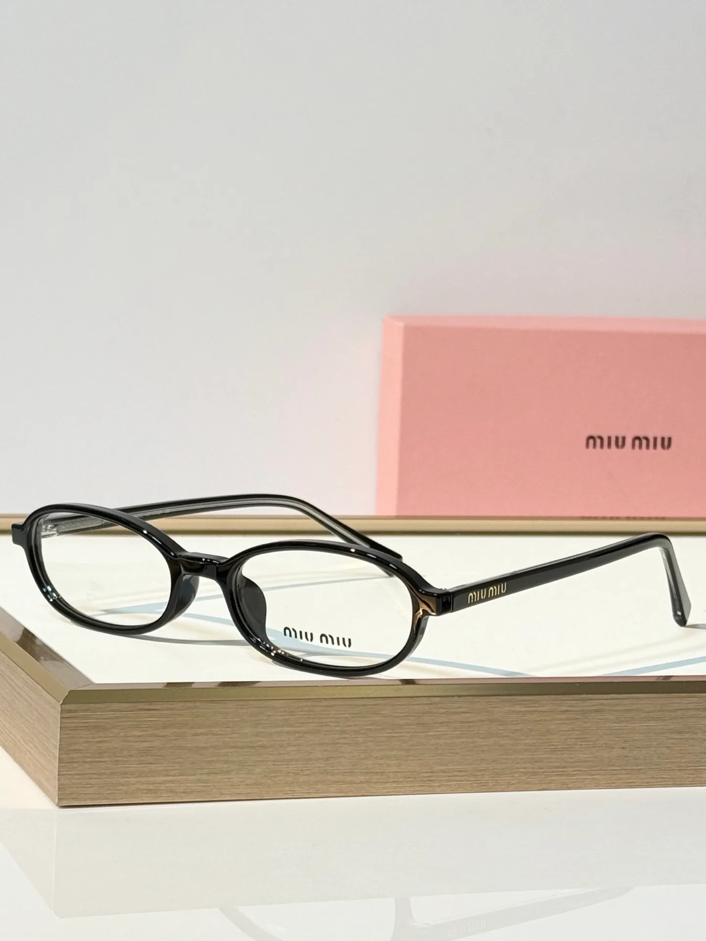Glasses MIU MIU 18117608