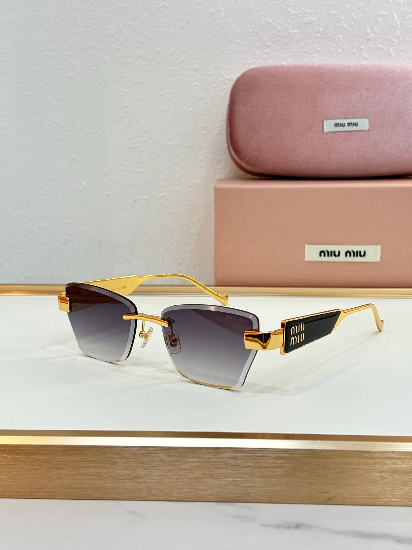 Glasses MIU MIU 18325670