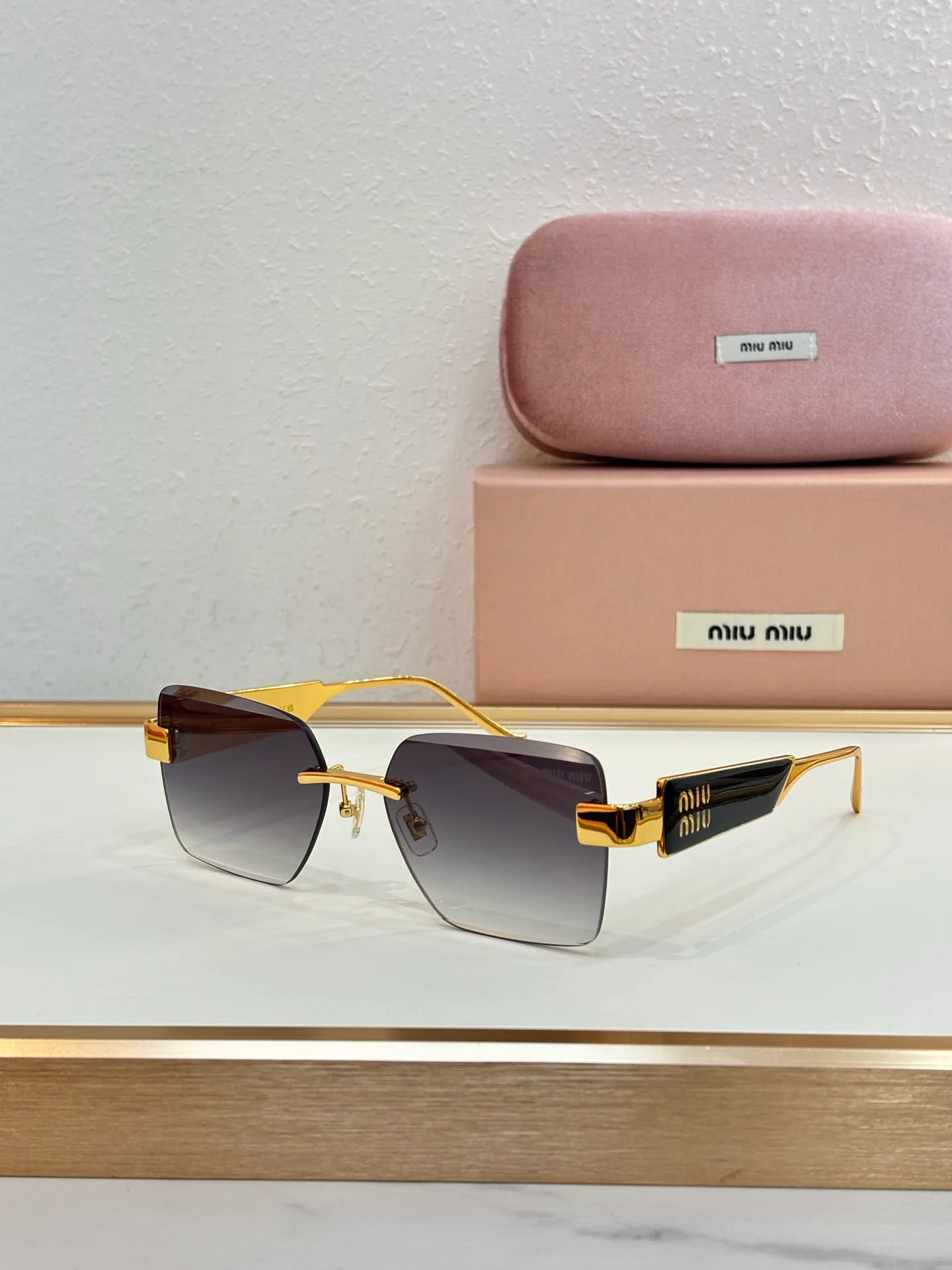 Glasses MIU MIU 18325671