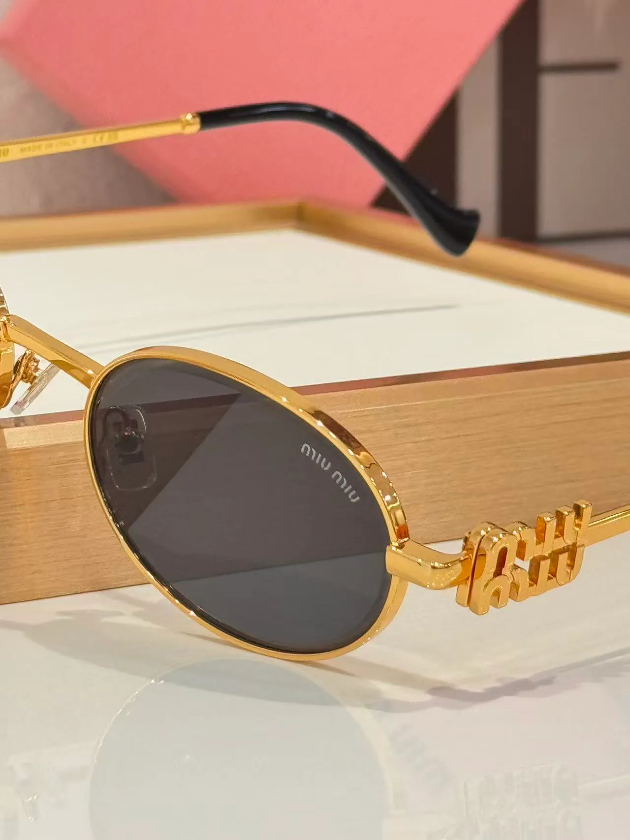 Glasses MIU MIU 18226204