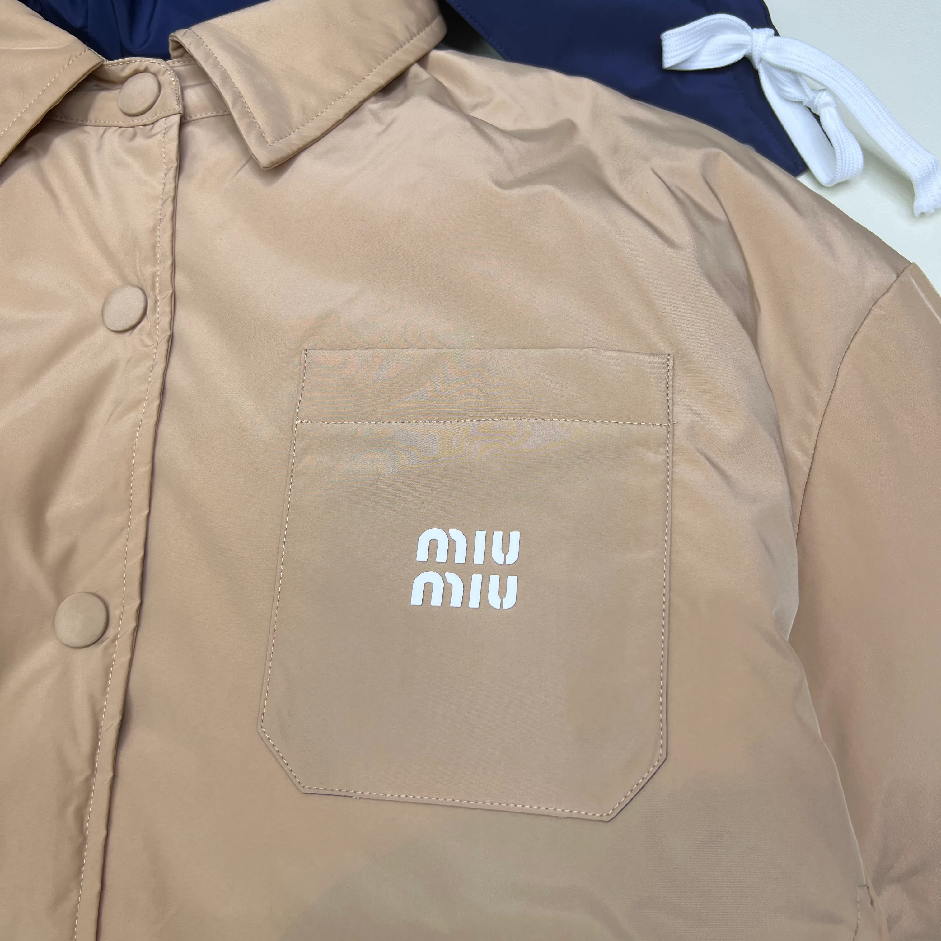 Women's Jackets And Down Jackets MIU MIU 18035506