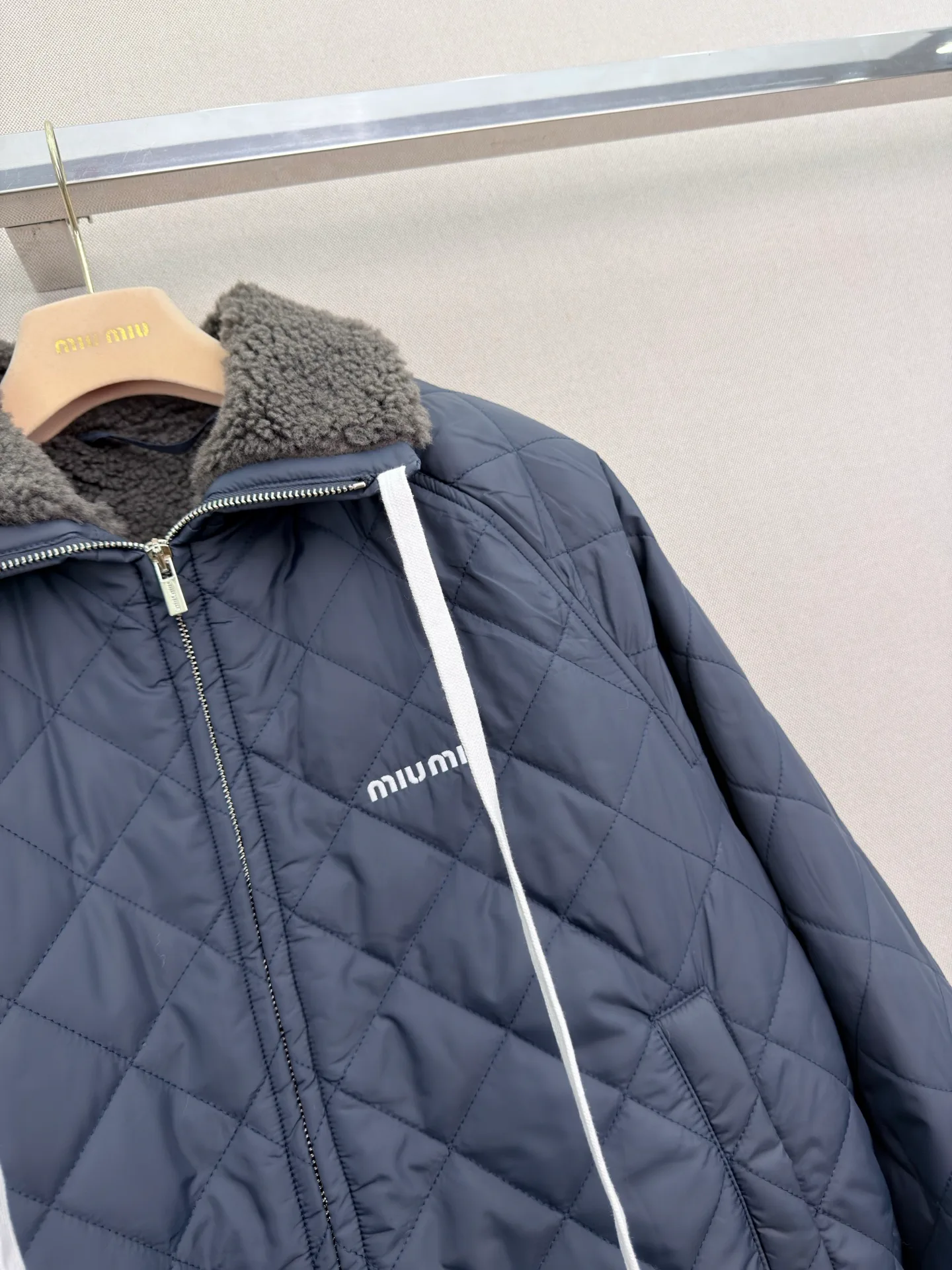 Women's Jackets And Down Jackets MIU MIU 18023482