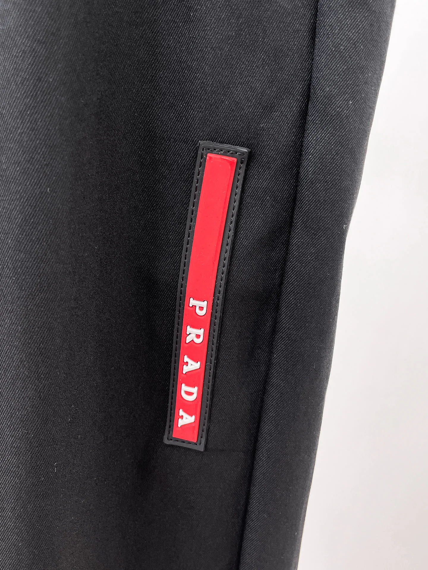 Men's Trousers PRADA 18399320
