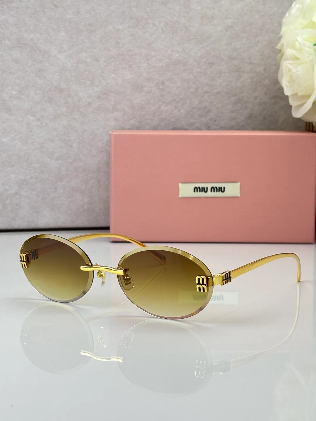 Glasses MIU MIU 18527878